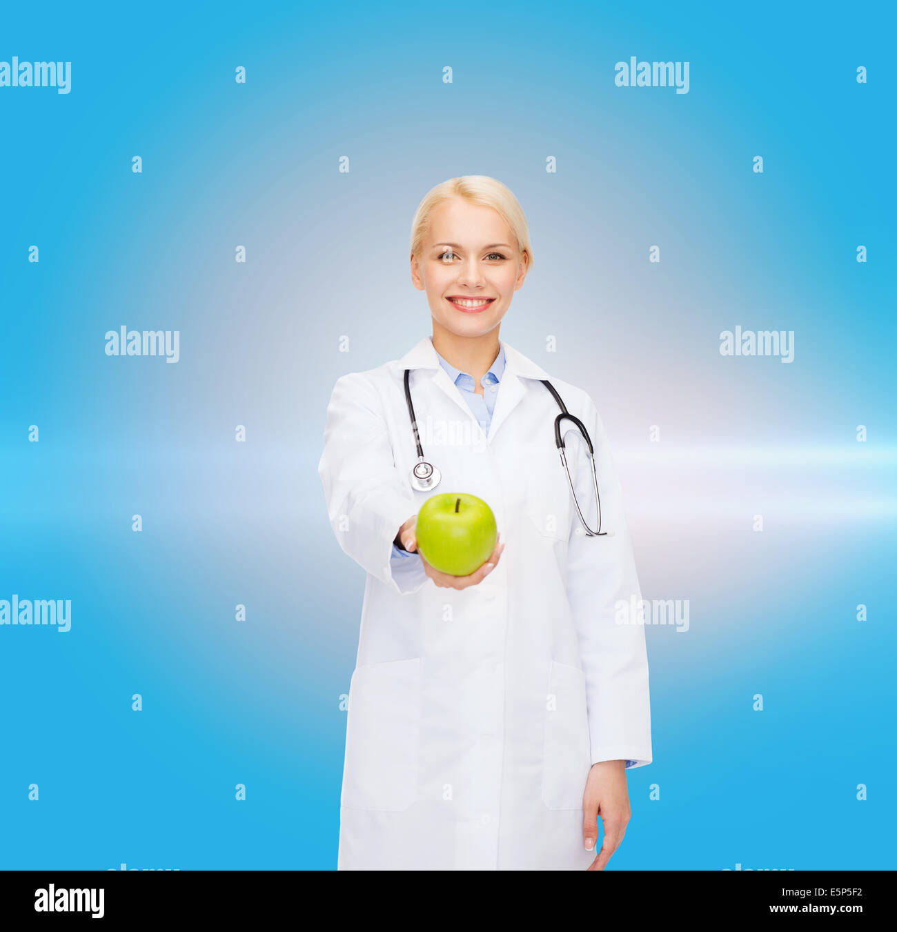 Female doctor smiling giving hi-res stock photography and images - Alamy