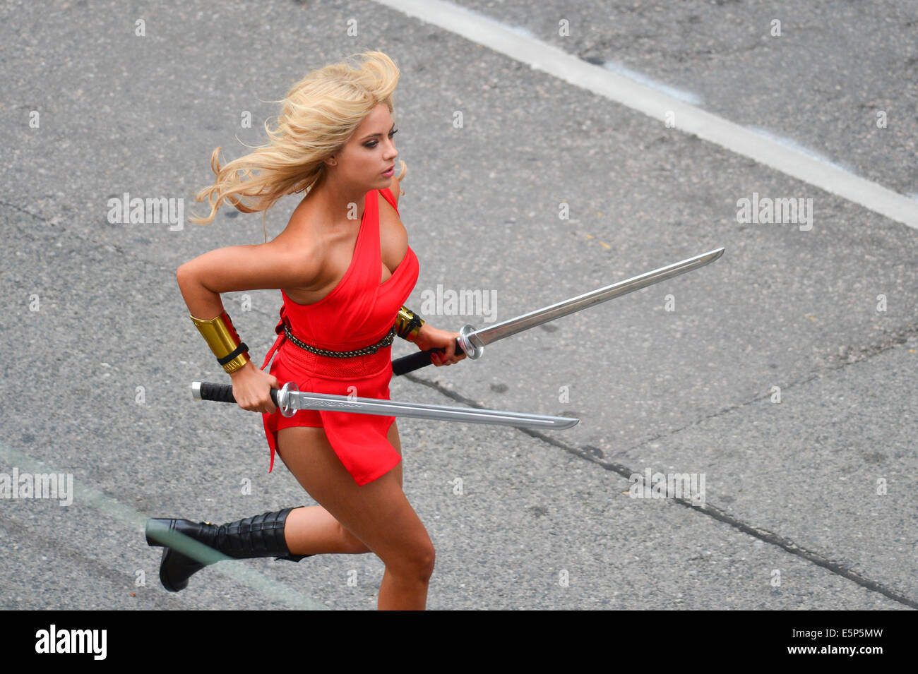 Toronto, Ontario, Canada. 4th Aug, 2014. On the movie set at 909 Bay Street in Toronto. 'Pixels' is an upcoming 2015 American 3D live-action/computer-animated film produced by Columbia Pictures and Happy Madison Productions. The film is directed by CHRIS COLUMBUS from a screenplay written by Tim Herlihy and Timothy Dowling. Main actors: ADAM SANDLER, KEVIN JAMES, JOSH GAD, PETER DINKLAGE, MICHELLE MONAGHAN, BRIAN COX, ASHLEY BENSON, and JANE KRAKOWSKI.Principal photography on the film began on June 2, 2014 in Toronto, Canada. Credit:  ZUMA Press, Inc./Alamy Live News Stock Photo