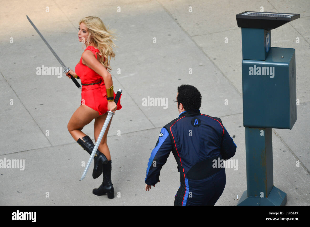 Toronto, Ontario, Canada. 4th Aug, 2014. On the movie set at 909 Bay Street in Toronto. 'Pixels' is an upcoming 2015 American 3D live-action/computer-animated film produced by Columbia Pictures and Happy Madison Productions. The film is directed by CHRIS COLUMBUS from a screenplay written by Tim Herlihy and Timothy Dowling. Main actors: ADAM SANDLER, KEVIN JAMES, JOSH GAD, PETER DINKLAGE, MICHELLE MONAGHAN, BRIAN COX, ASHLEY BENSON, and JANE KRAKOWSKI.Principal photography on the film began on June 2, 2014 in Toronto, Canada. Credit:  ZUMA Press, Inc./Alamy Live News Stock Photo