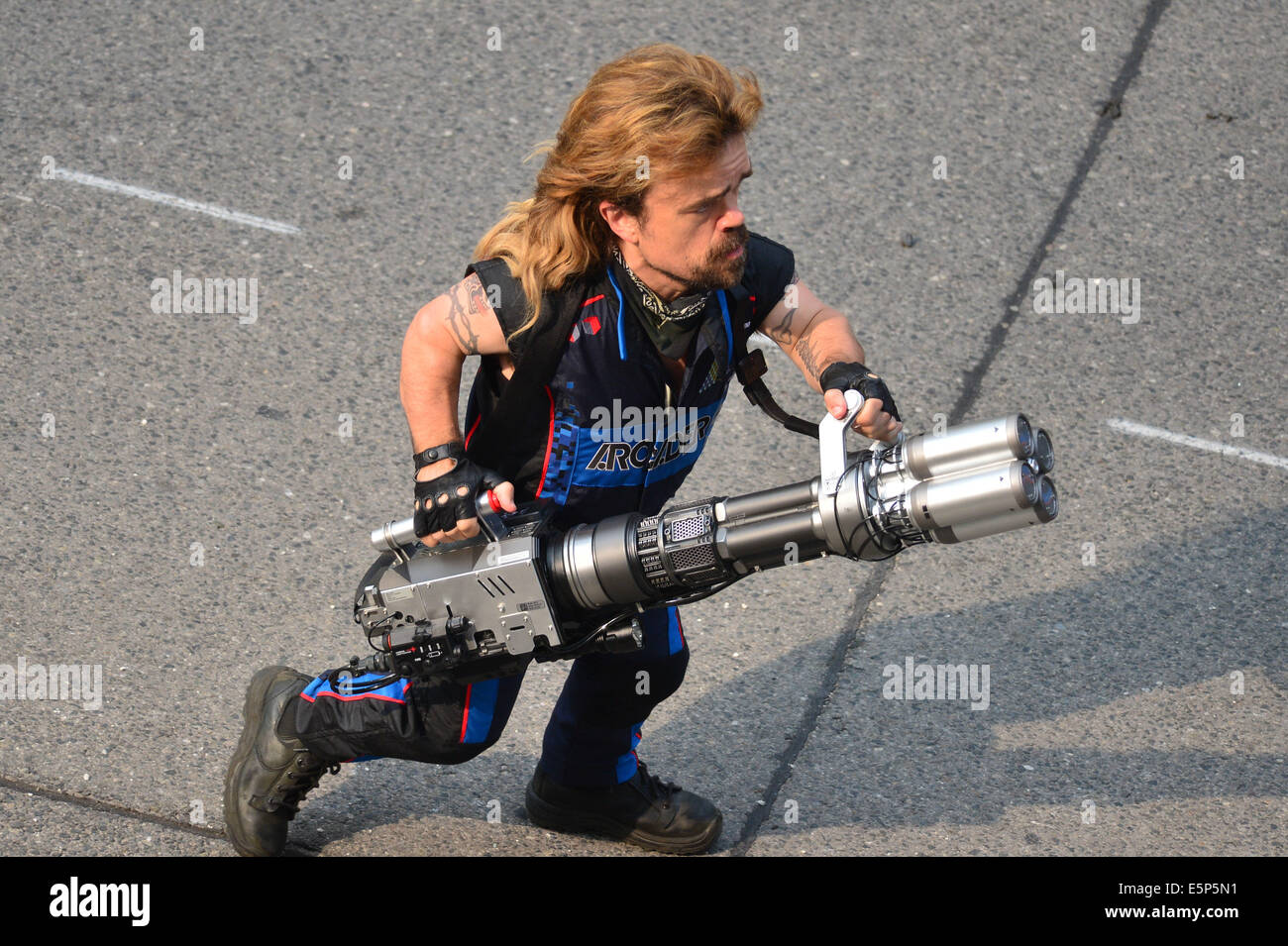 Toronto, Ontario, Canada. 4th Aug, 2014. On the movie set at 909 Bay Street in Toronto. 'Pixels' is an upcoming 2015 American 3D live-action/computer-animated film produced by Columbia Pictures and Happy Madison Productions. The film is directed by CHRIS COLUMBUS from a screenplay written by Tim Herlihy and Timothy Dowling. Main actors: ADAM SANDLER, KEVIN JAMES, JOSH GAD, PETER DINKLAGE, MICHELLE MONAGHAN, BRIAN COX, ASHLEY BENSON, and JANE KRAKOWSKI.Principal photography on the film began on June 2, 2014 in Toronto, Canada. Credit:  ZUMA Press, Inc./Alamy Live News Stock Photo