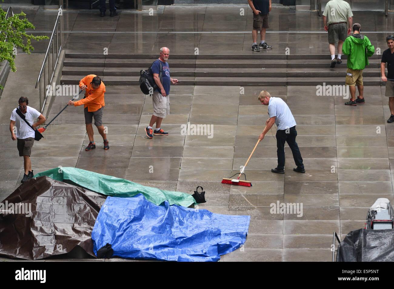 Toronto, Ontario, Canada. 4th Aug, 2014. On the movie set at 909 Bay Street in Toronto. 'Pixels' is an upcoming 2015 American 3D live-action/computer-animated film produced by Columbia Pictures and Happy Madison Productions. The film is directed by CHRIS COLUMBUS from a screenplay written by Tim Herlihy and Timothy Dowling. Main actors: ADAM SANDLER, KEVIN JAMES, JOSH GAD, PETER DINKLAGE, MICHELLE MONAGHAN, BRIAN COX, ASHLEY BENSON, and JANE KRAKOWSKI.Principal photography on the film began on June 2, 2014 in Toronto, Canada. Credit:  ZUMA Press, Inc./Alamy Live News Stock Photo