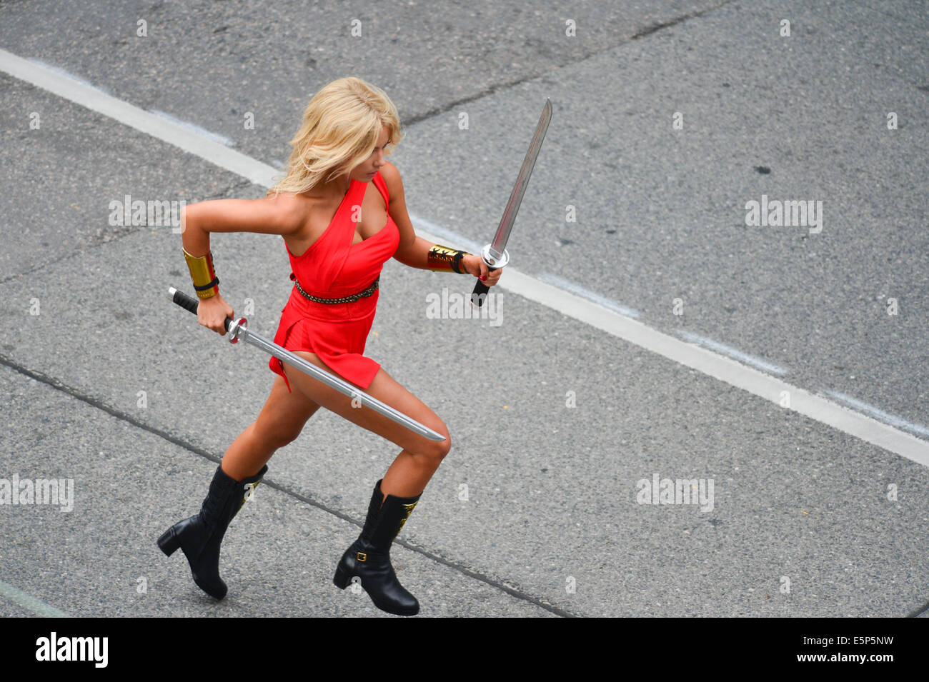 Toronto, Ontario, Canada. 4th Aug, 2014. On the movie set at 909 Bay Street in Toronto. 'Pixels' is an upcoming 2015 American 3D live-action/computer-animated film produced by Columbia Pictures and Happy Madison Productions. The film is directed by CHRIS COLUMBUS from a screenplay written by Tim Herlihy and Timothy Dowling. Main actors: ADAM SANDLER, KEVIN JAMES, JOSH GAD, PETER DINKLAGE, MICHELLE MONAGHAN, BRIAN COX, ASHLEY BENSON, and JANE KRAKOWSKI.Principal photography on the film began on June 2, 2014 in Toronto, Canada. Credit:  ZUMA Press, Inc./Alamy Live News Stock Photo