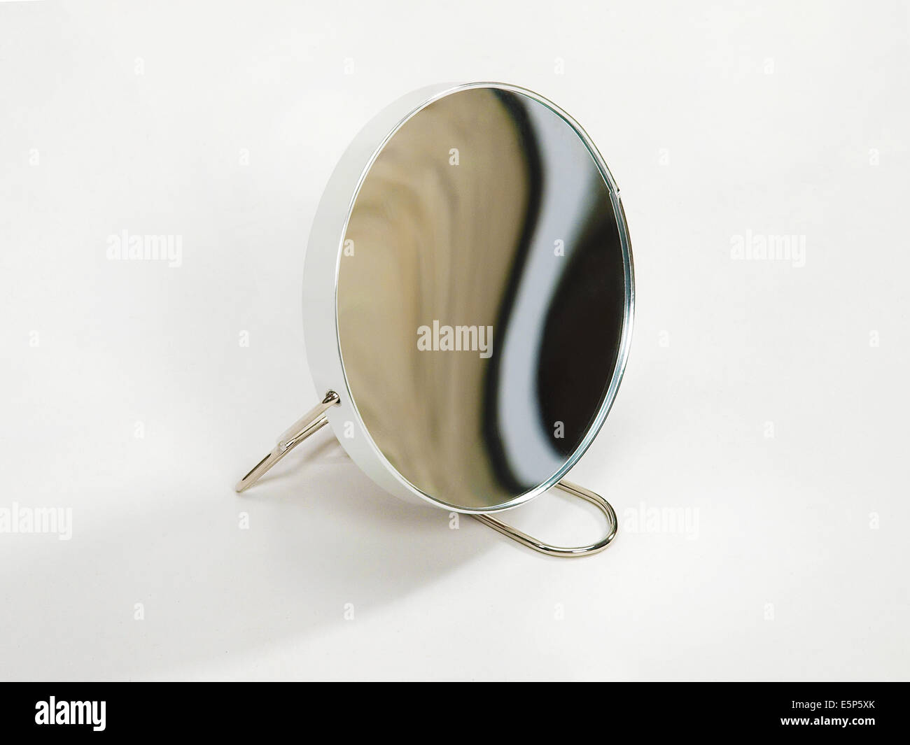 Round mirror on stand Stock Photo Alamy