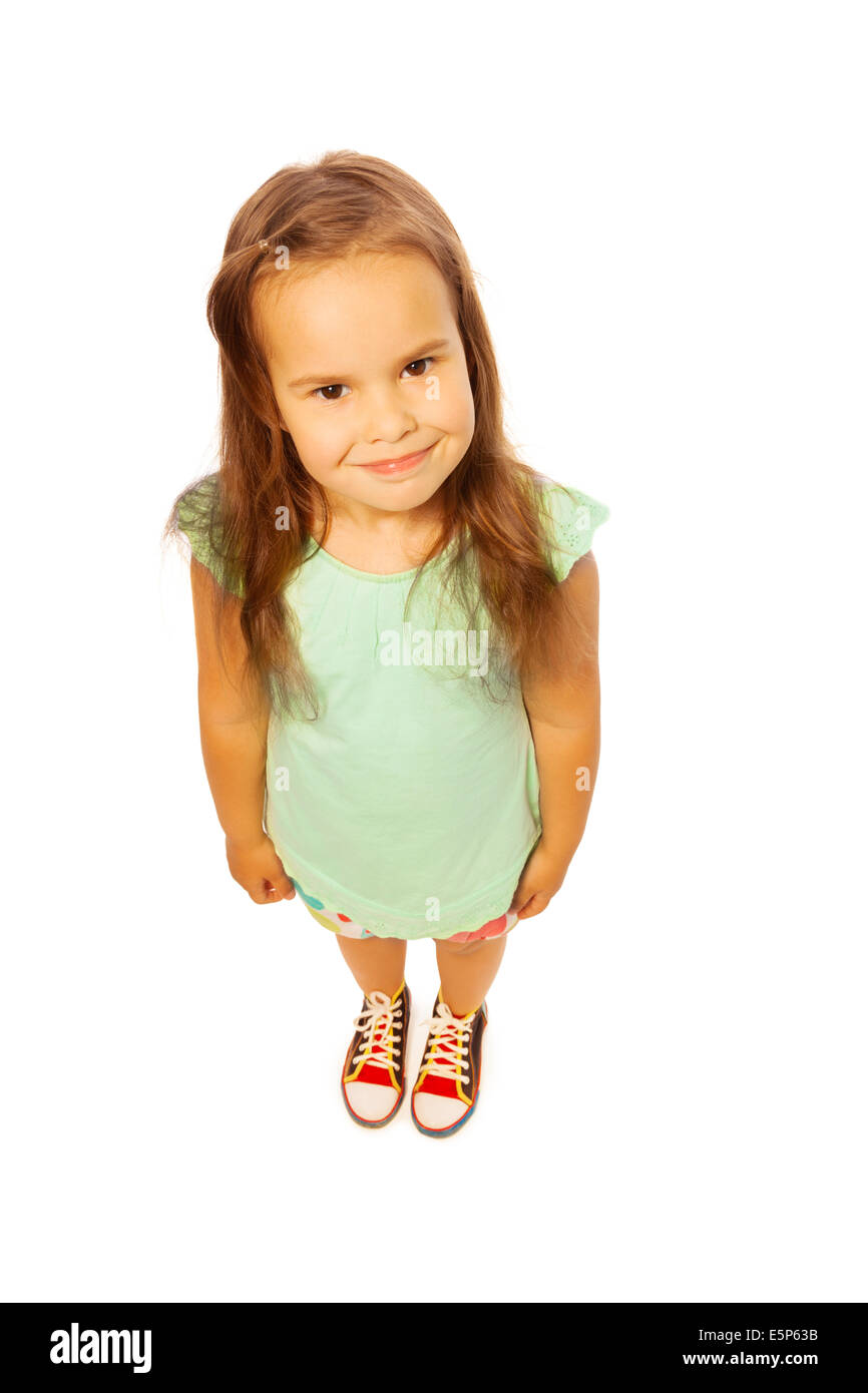 Cute girl in green shirt on a white background Stock Photo Alamy