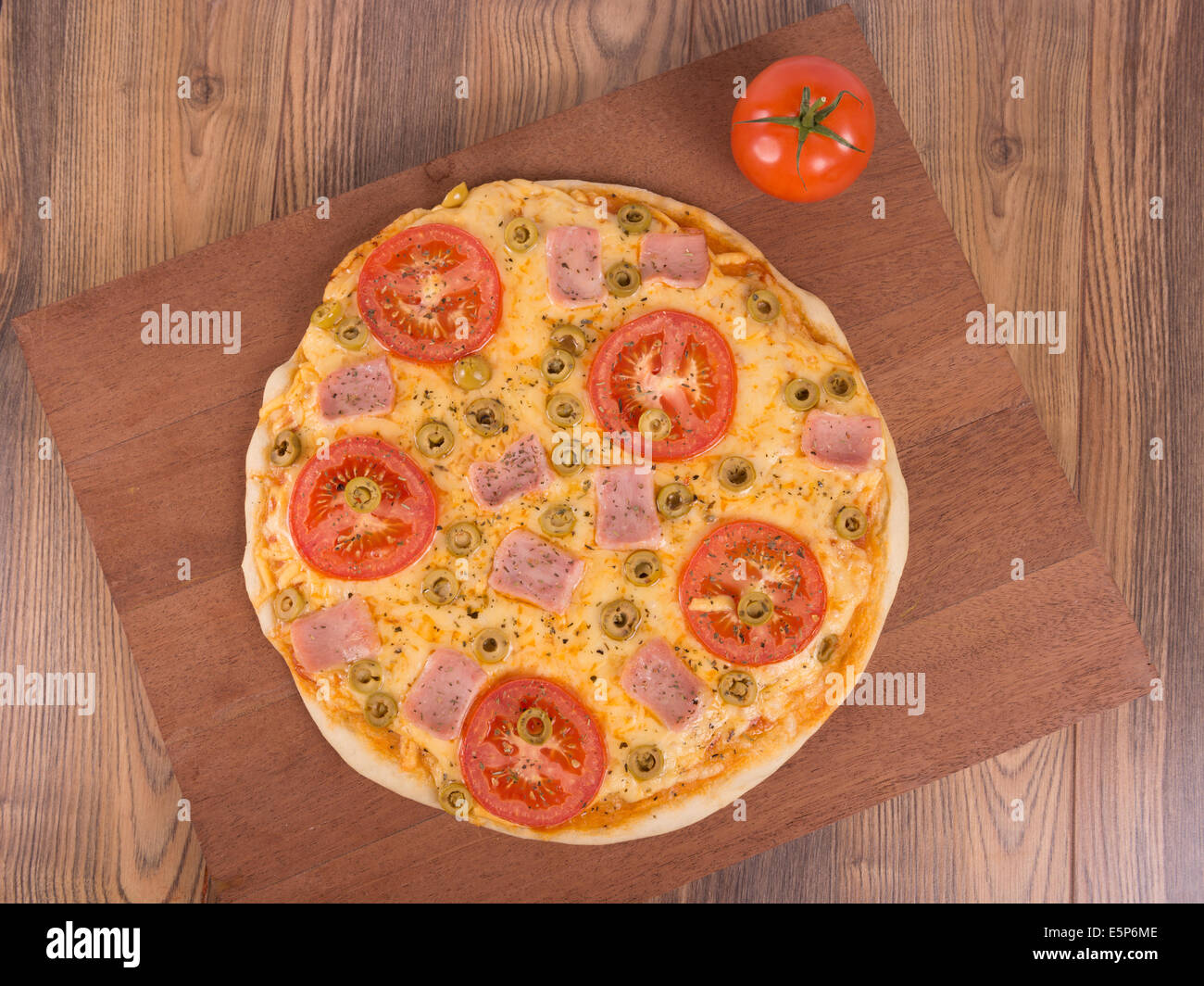 tomato pizza with ham and cheese Stock Photo