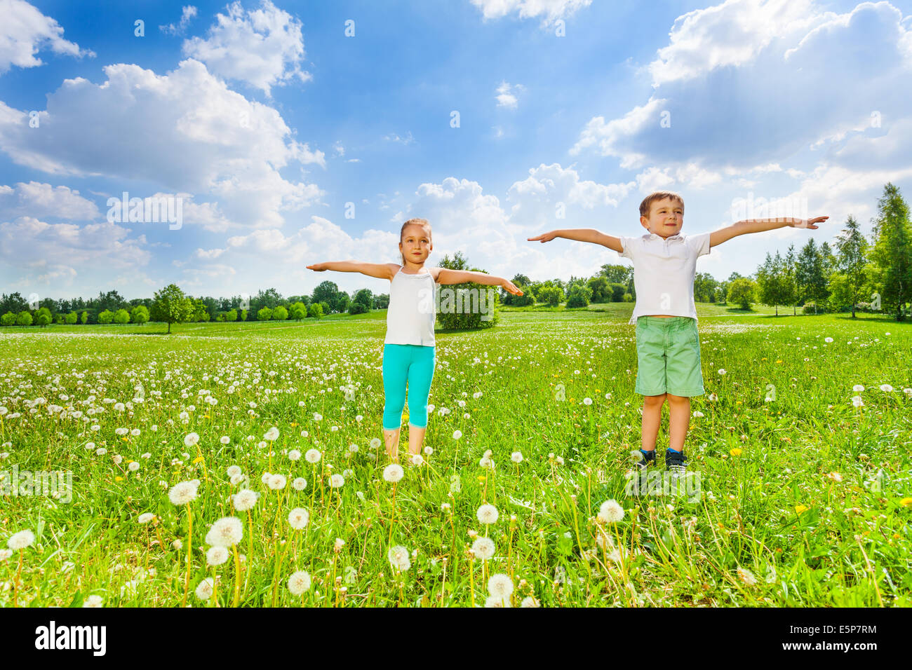 Two kids doing gymnastics stock photo alamy