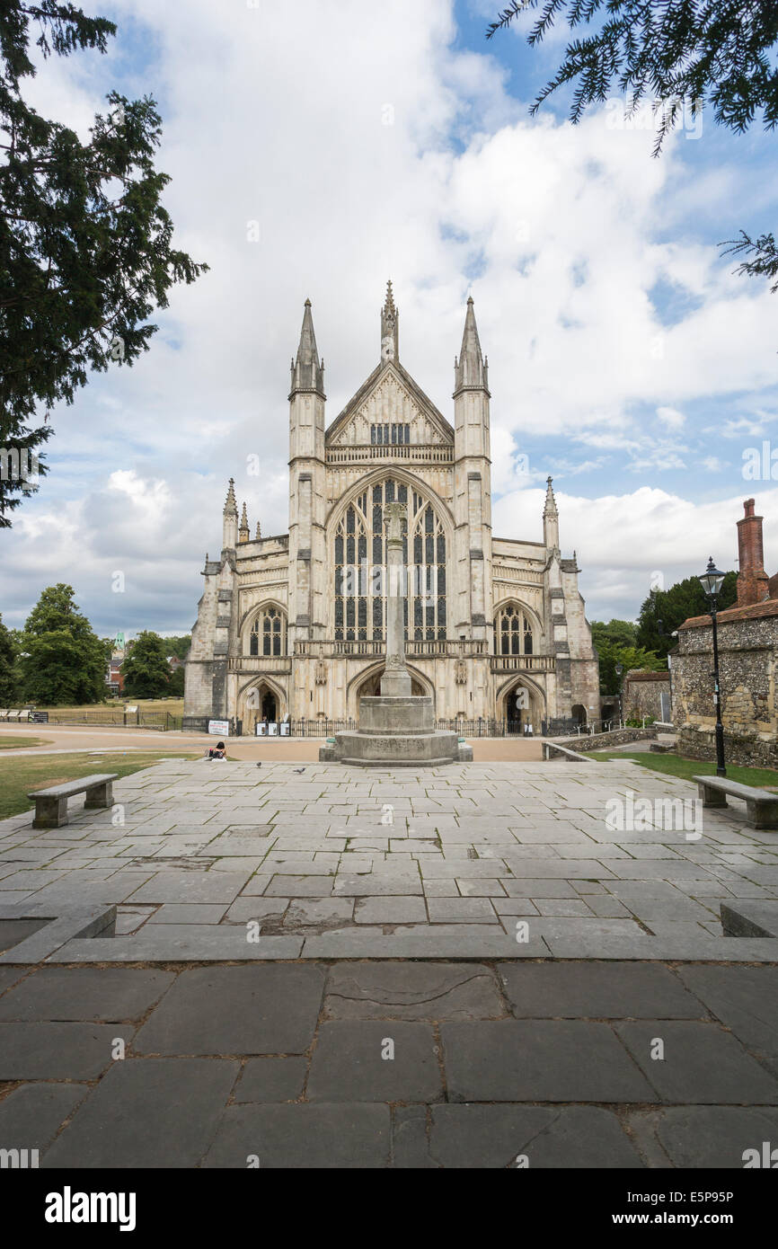 View of Winchester Cathedral front entrance façade and 1914-1919 First World War memorial in the cathedral precincts, City of Winchester, Hampshire: UK history, historic building, sightseeing, landscape and architecture Stock Photo