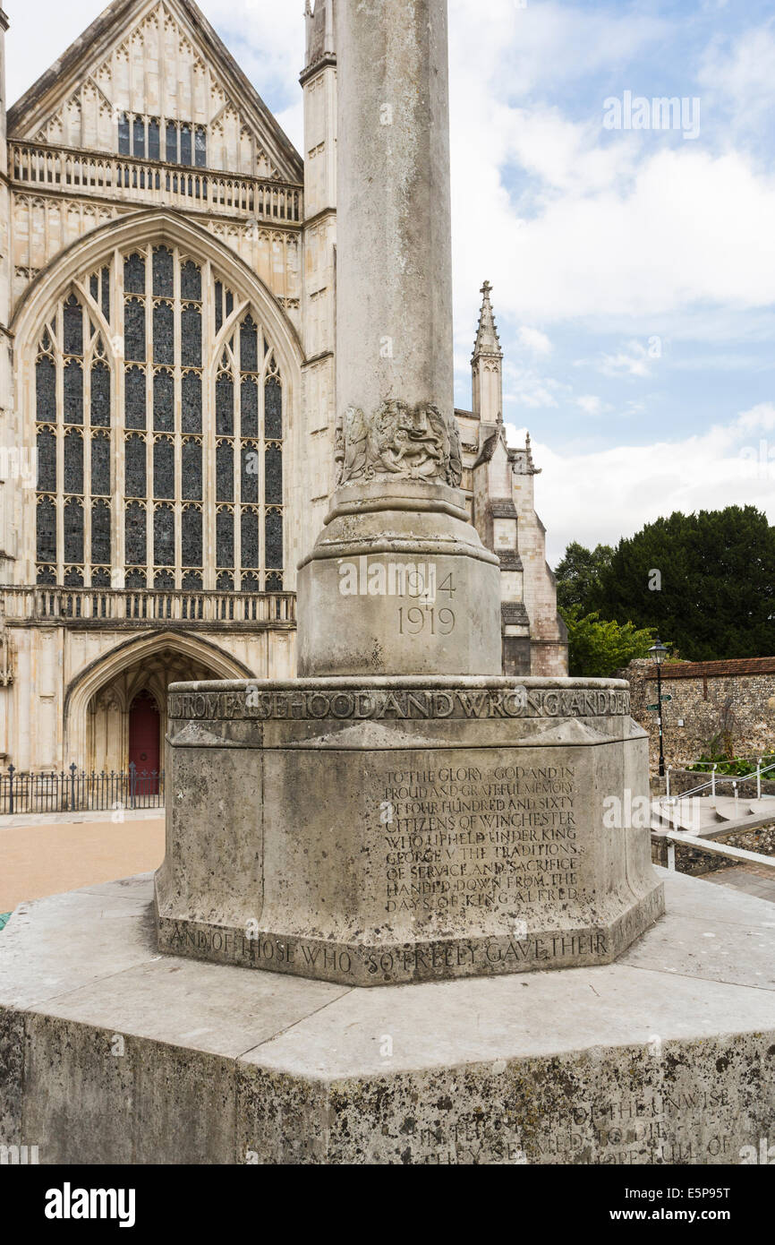 View of Winchester Cathedral front façade and 1914-1919 First World War memorial in the cathedral precincts, City of Winchester, Hampshire: UK history, historic building, sightseeing, landscape and architecture Stock Photo