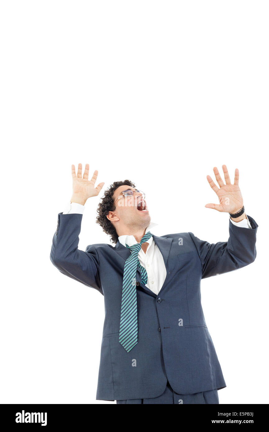 frightened business man looking up, fear of somethnig, mobbing at work from someone, high prices on market, high or low shares i Stock Photo