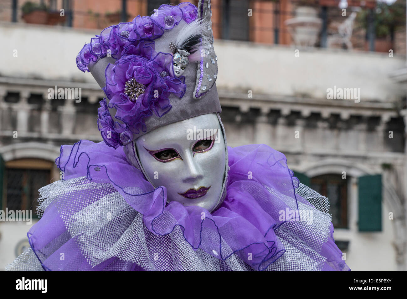 Closeup of man in stylized silver & purple clown costume in San ...