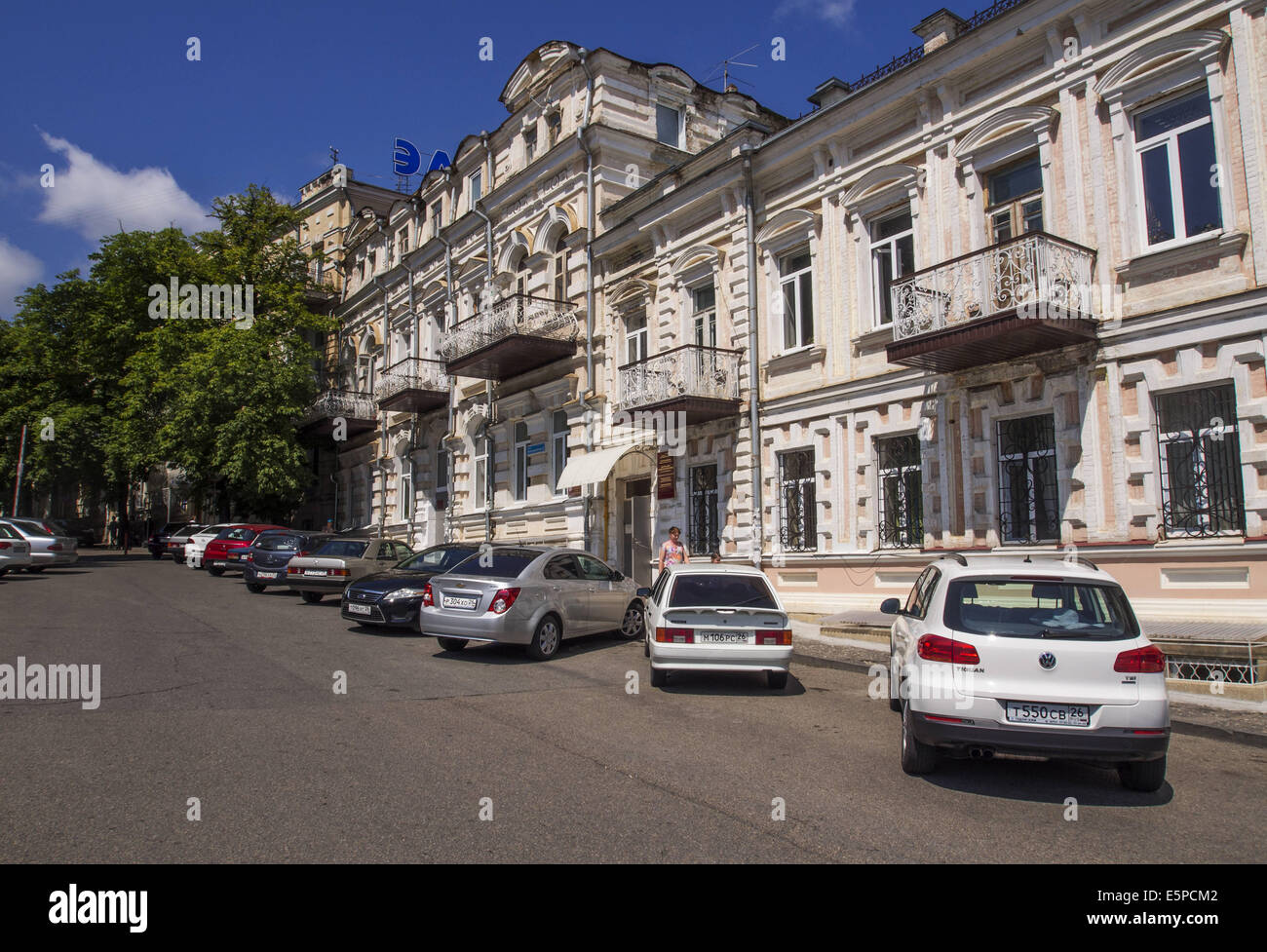 July 30, 2014 - The central part of Zheleznovodsk. Zheleznovodsk is a town in Stavropol Krai, Russia. Zheleznovodsk, along with Pyatigorsk, Yessentuki, Kislovodsk, and Mineralnye Vody, is a part of the Caucasus Mineral Waters, a renowned Russian spa resort. The town economy revolves around sanatoria, where dozens of thousands of people from all over Russia and former Soviet republics come year-around to vacation and rest, as well as prevent and treat numerous stomach, kidney, and liver diseases. Dozens of spas operate in Russia's Caucasus Mountains region, exploiting the mineral springs in th Stock Photo
