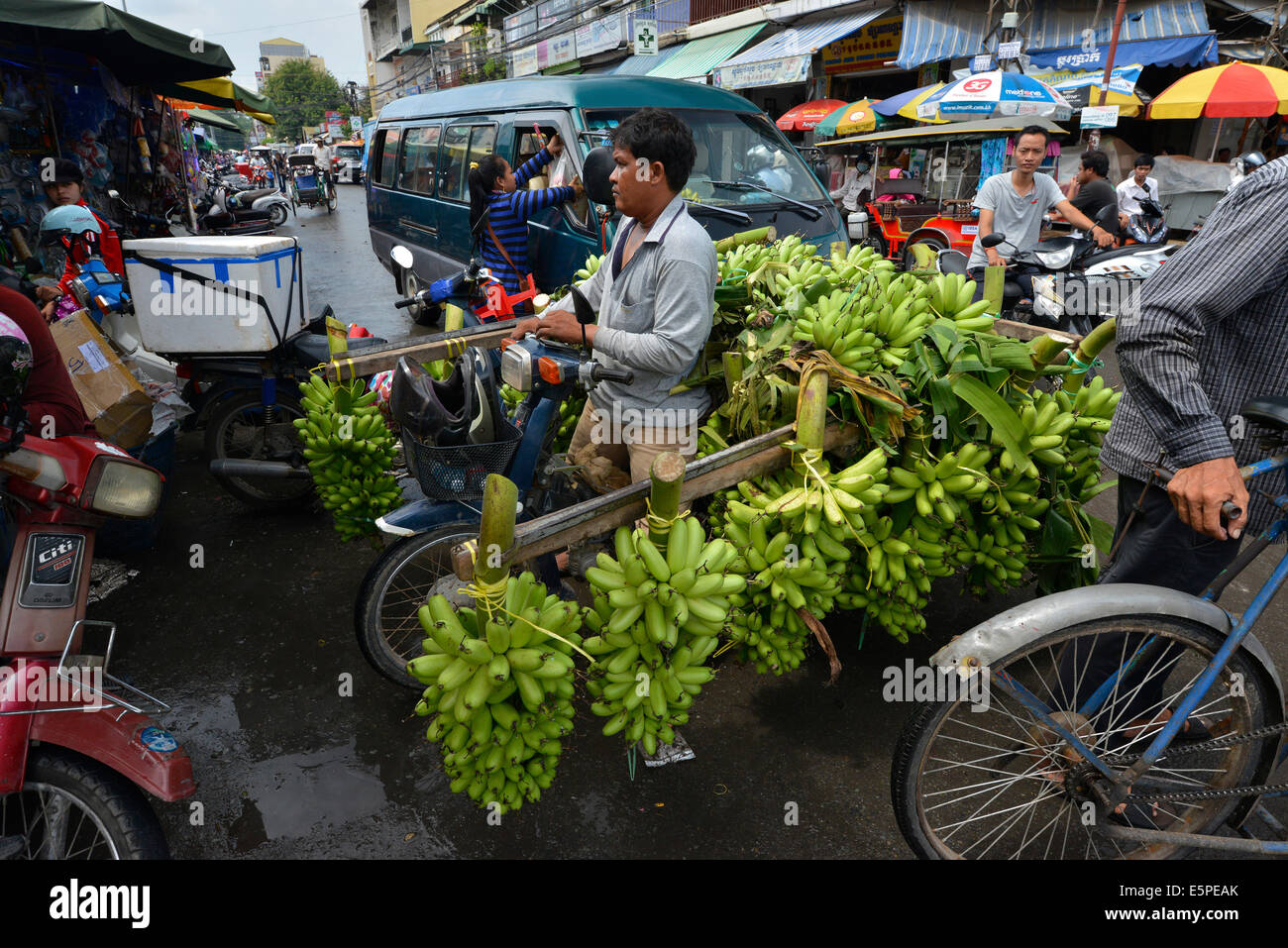 Banana seller with a moped, market, Phnom Penh, Cambodia Stock Photo ...