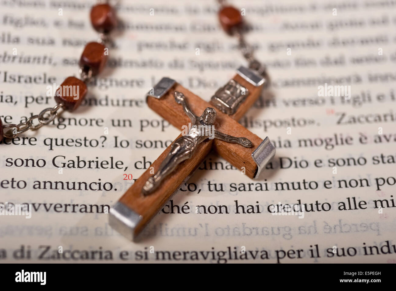 Holy cross on the bible Stock Photo - Alamy