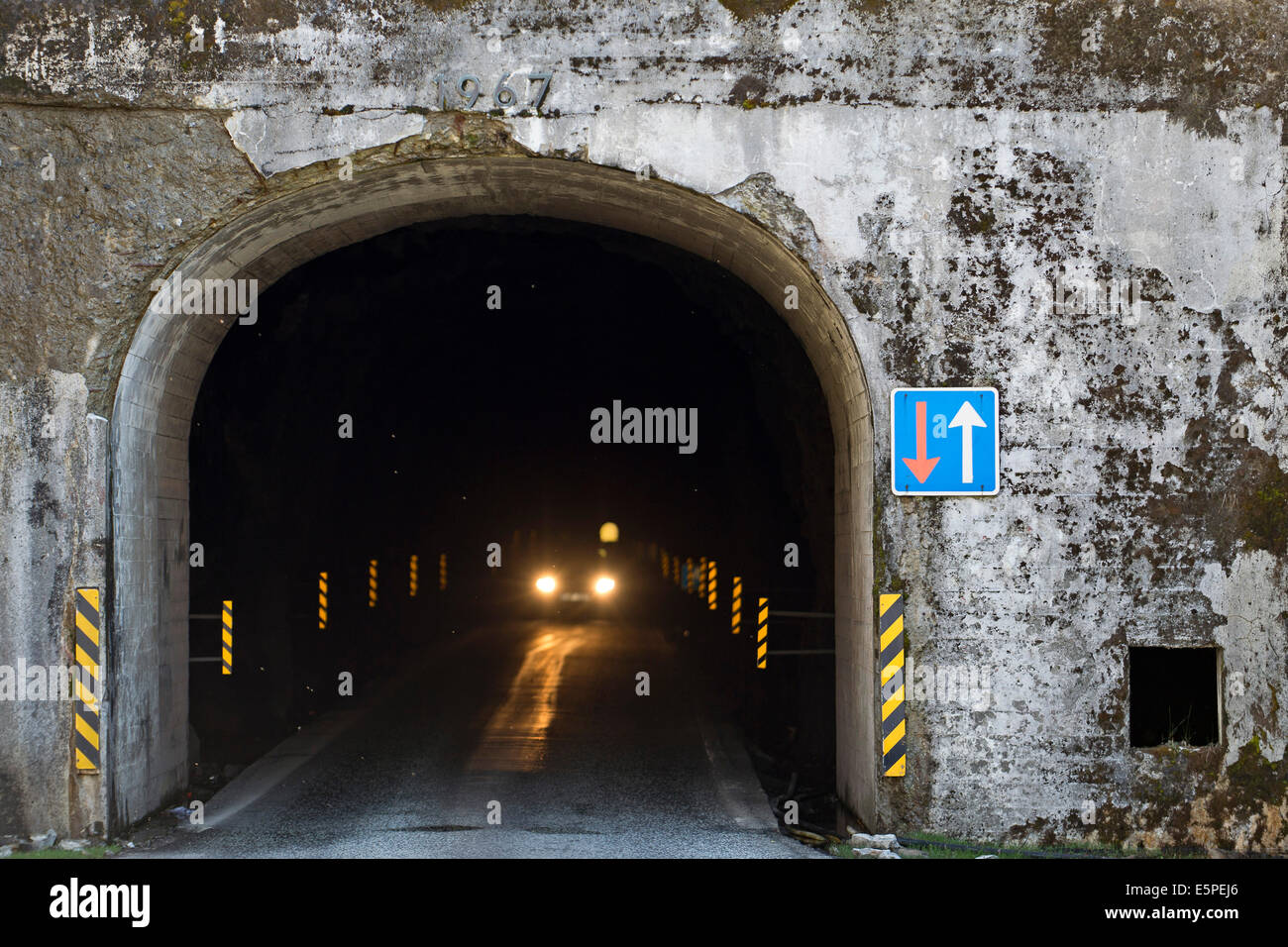 Exit of a single-track tunnel between Ánir and Árnafjørður, Borðoy, Faroe Islands, Denmark Stock Photo
