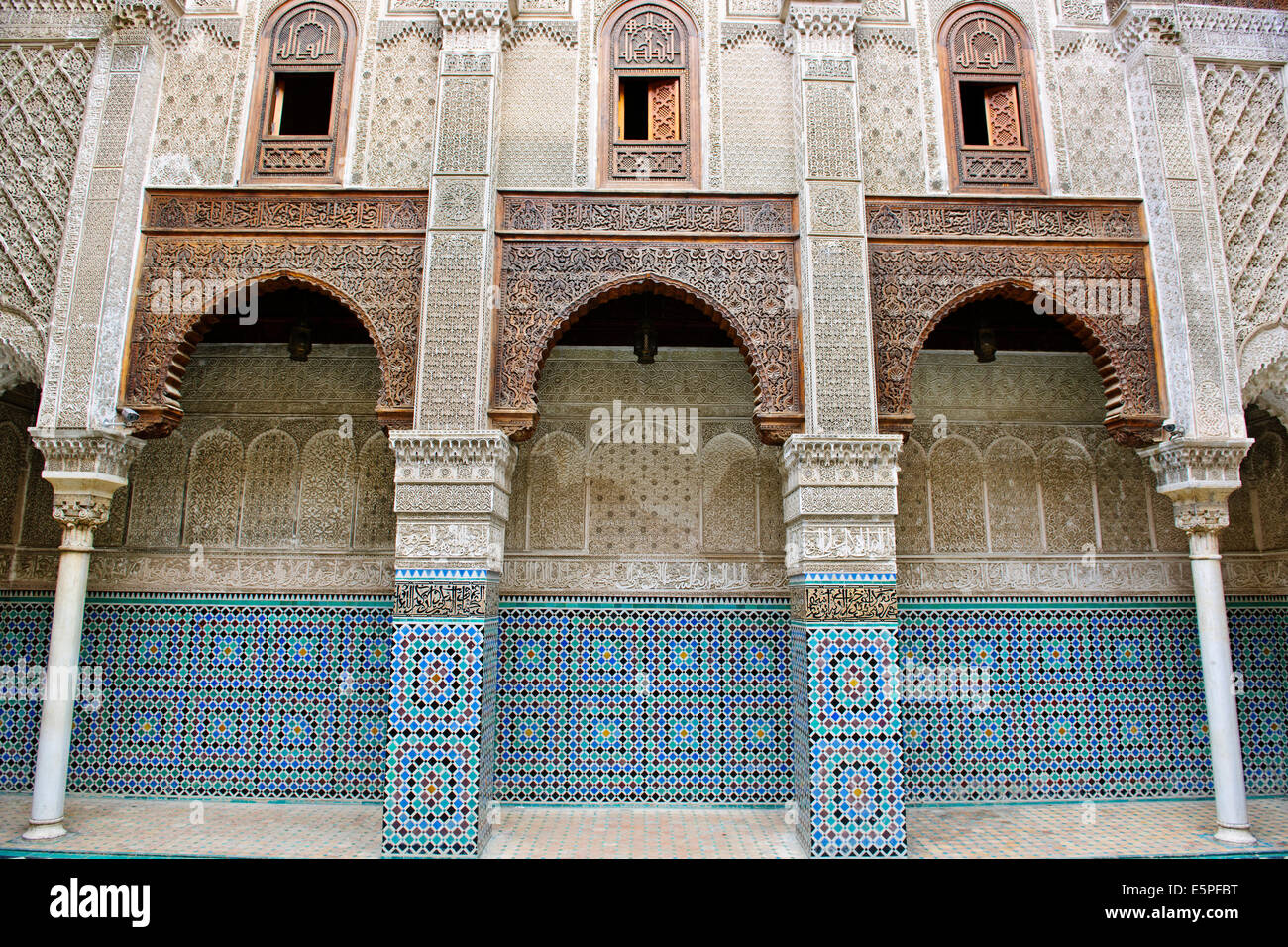 Madersa,Madrasa,Seat of Learning,School,Carved stucco panels,fountain courtyard,Cedar wood doors,Madrasa Seffarine,Fez,Morocco Stock Photo