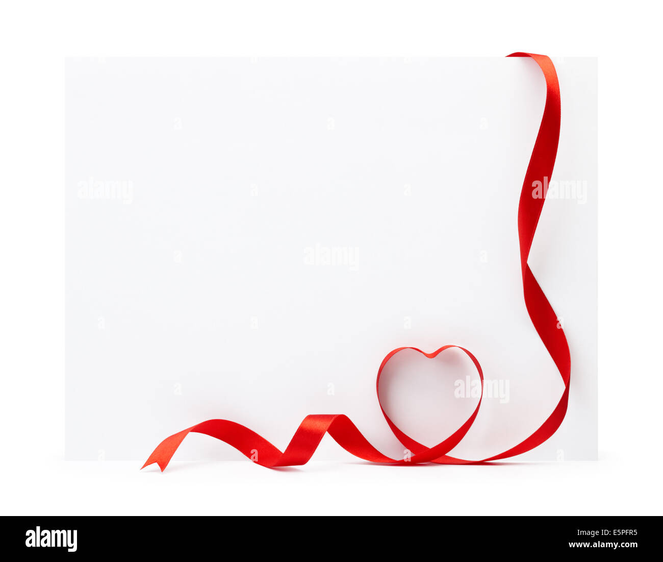 blank greeting card with ribbon form into heart shape Stock Photo