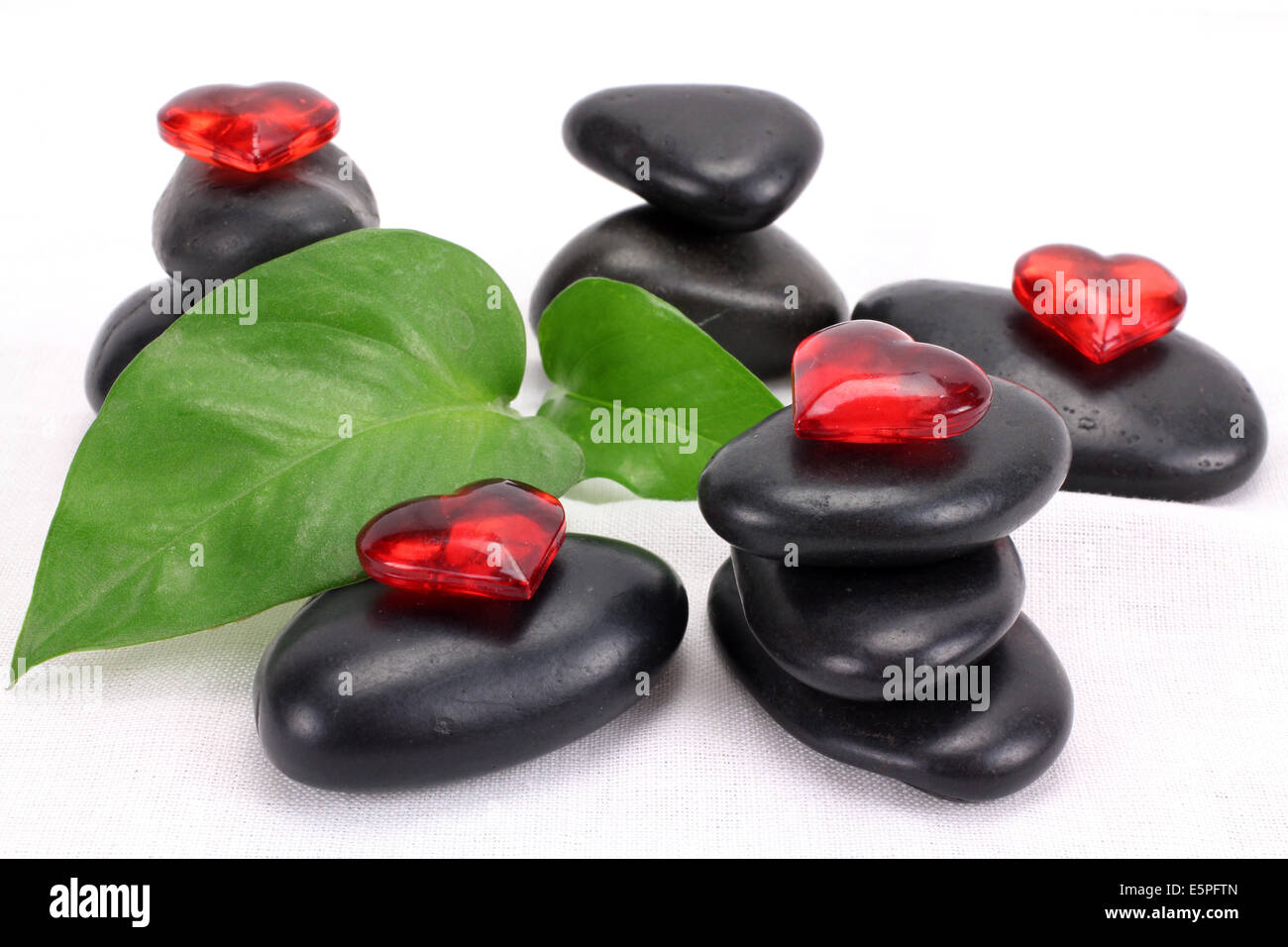 A pile of balanced black spa therapy stones Stock Photo
