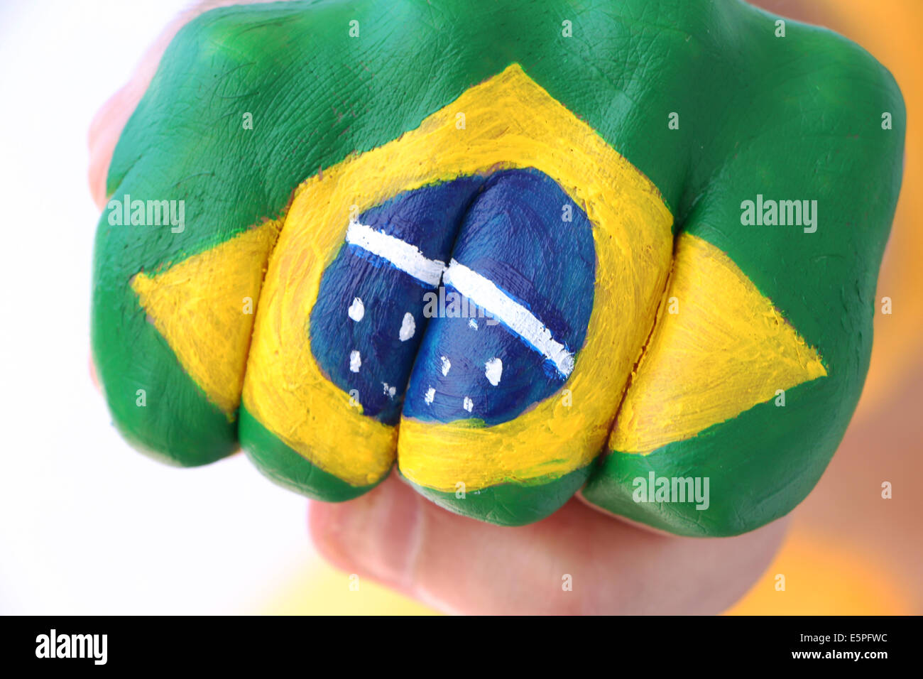 Brazilian flag on man's fist Stock Photo Alamy