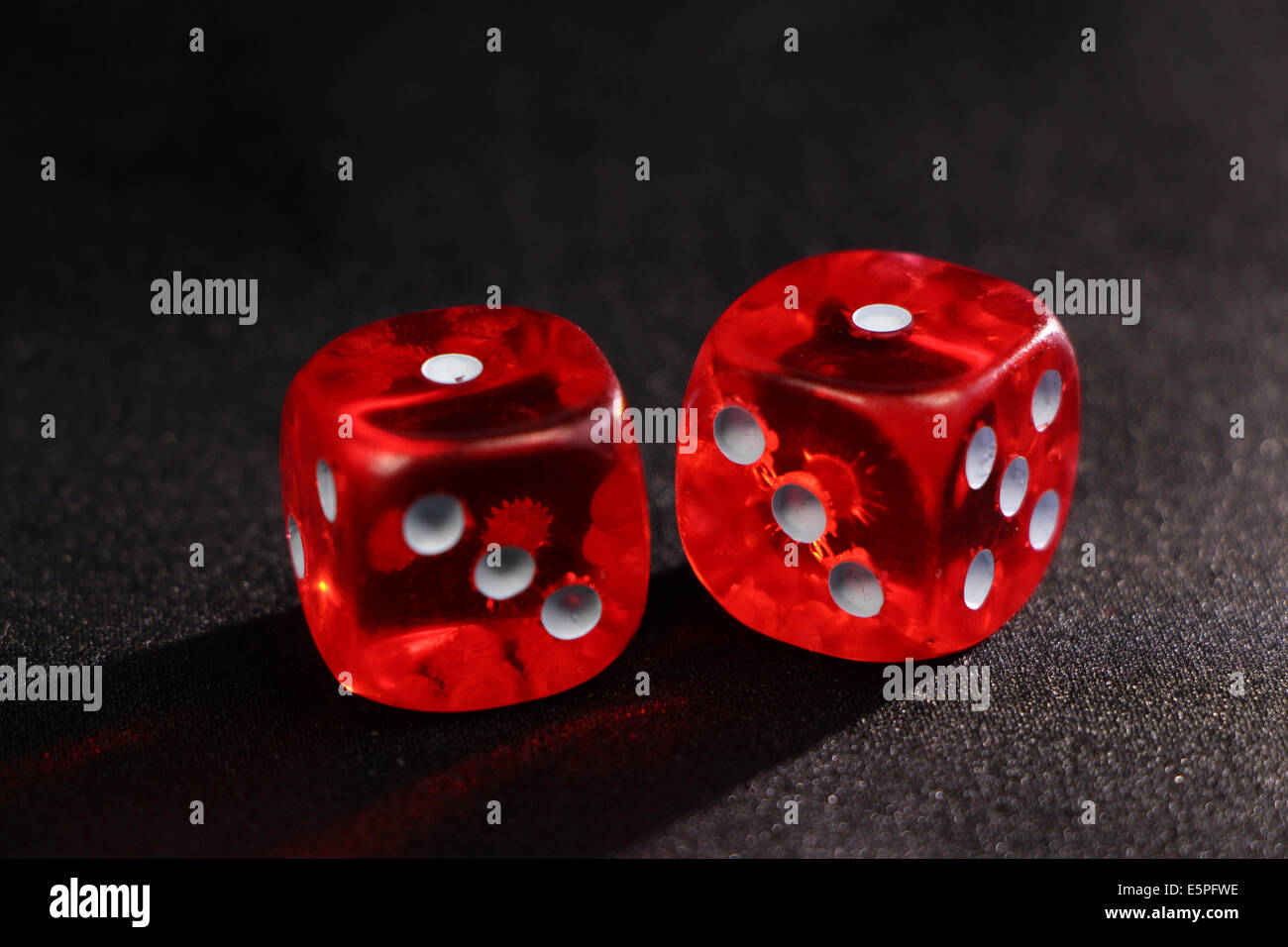 red dice on black background Stock Photo