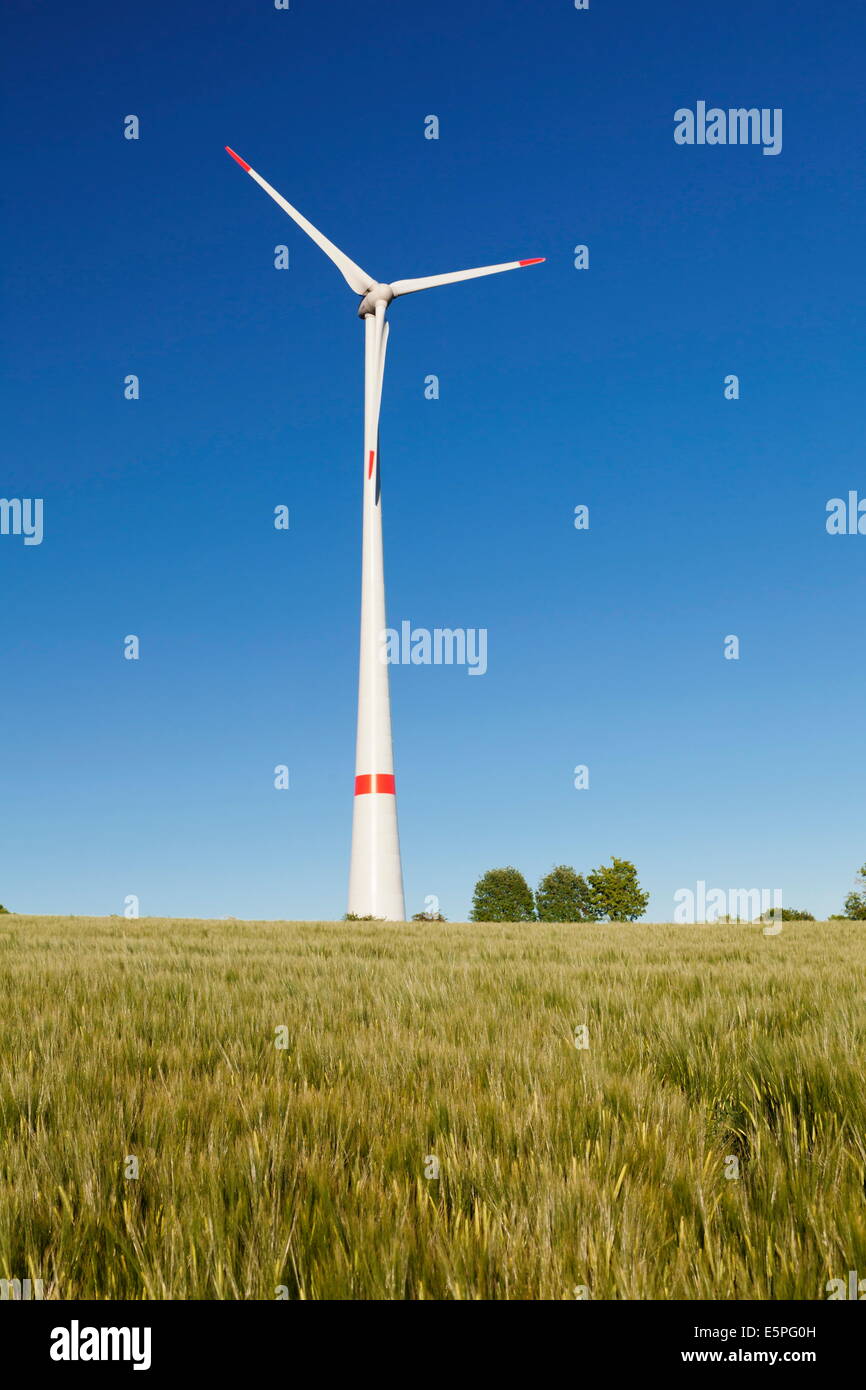 Wind turbine on a field in the evening light, Black Forest, Baden Wurttemberg, Germany, Europe Stock Photo
