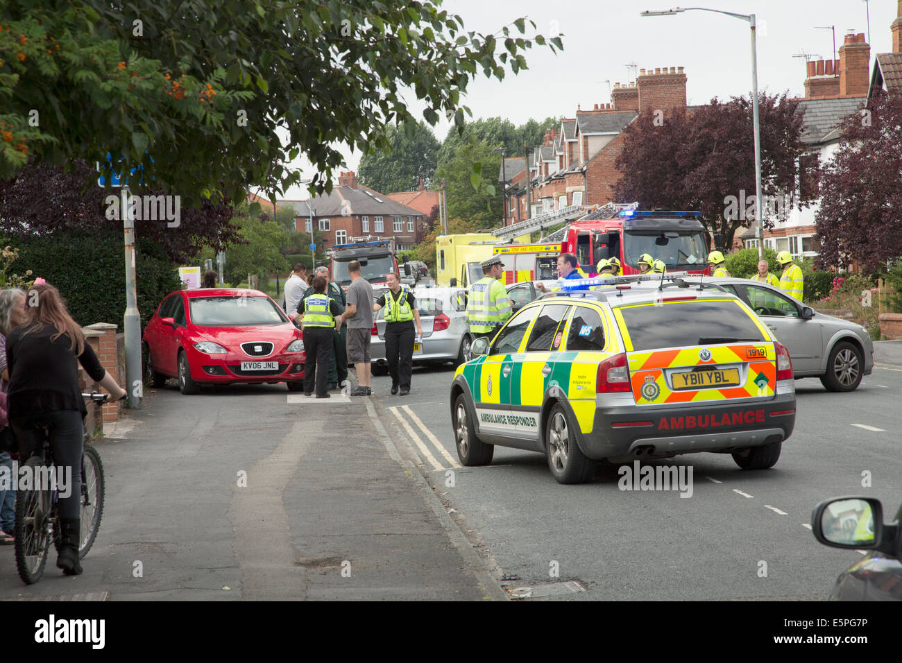 Road accident scene on a busy residential street in York, North Yorkshire, England. Stock Photo