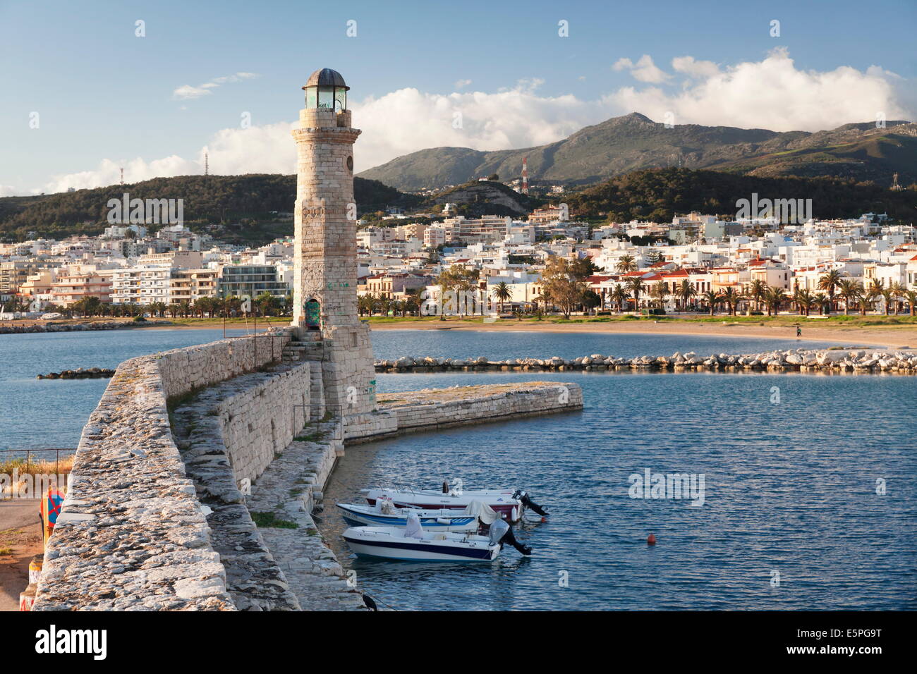 Lighthouse at old Venetian harbour, Rethymno (Rethymnon), Crete, Greek Islands, Greece, Europe Stock Photo