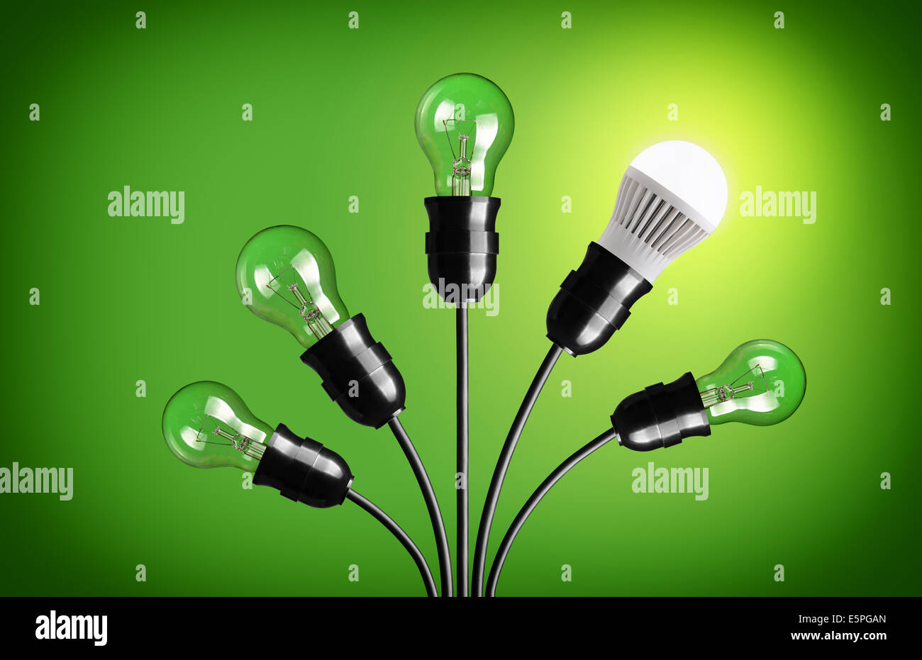 Idea concept with light bulbs. Green background Stock Photo
