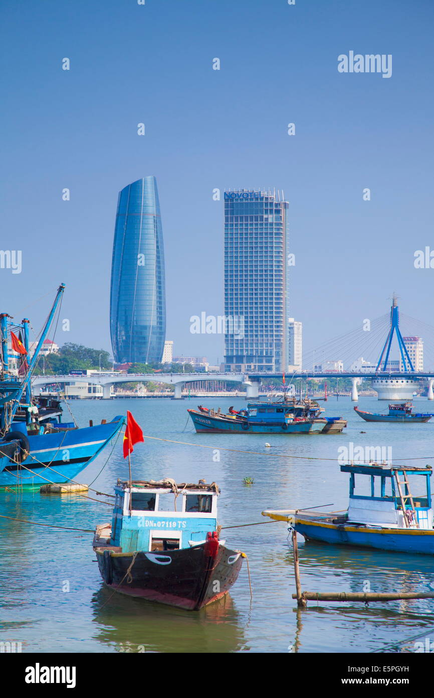 Fishing boats on Song River and city skyline, Da Nang, Vietnam, Indochina, Southeast Asia, Asia Stock Photo