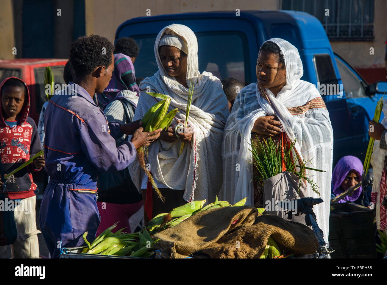 Orthodox dressed woman buying vegetables, Asmara, capital of Eritrea, Africa Stock Photo