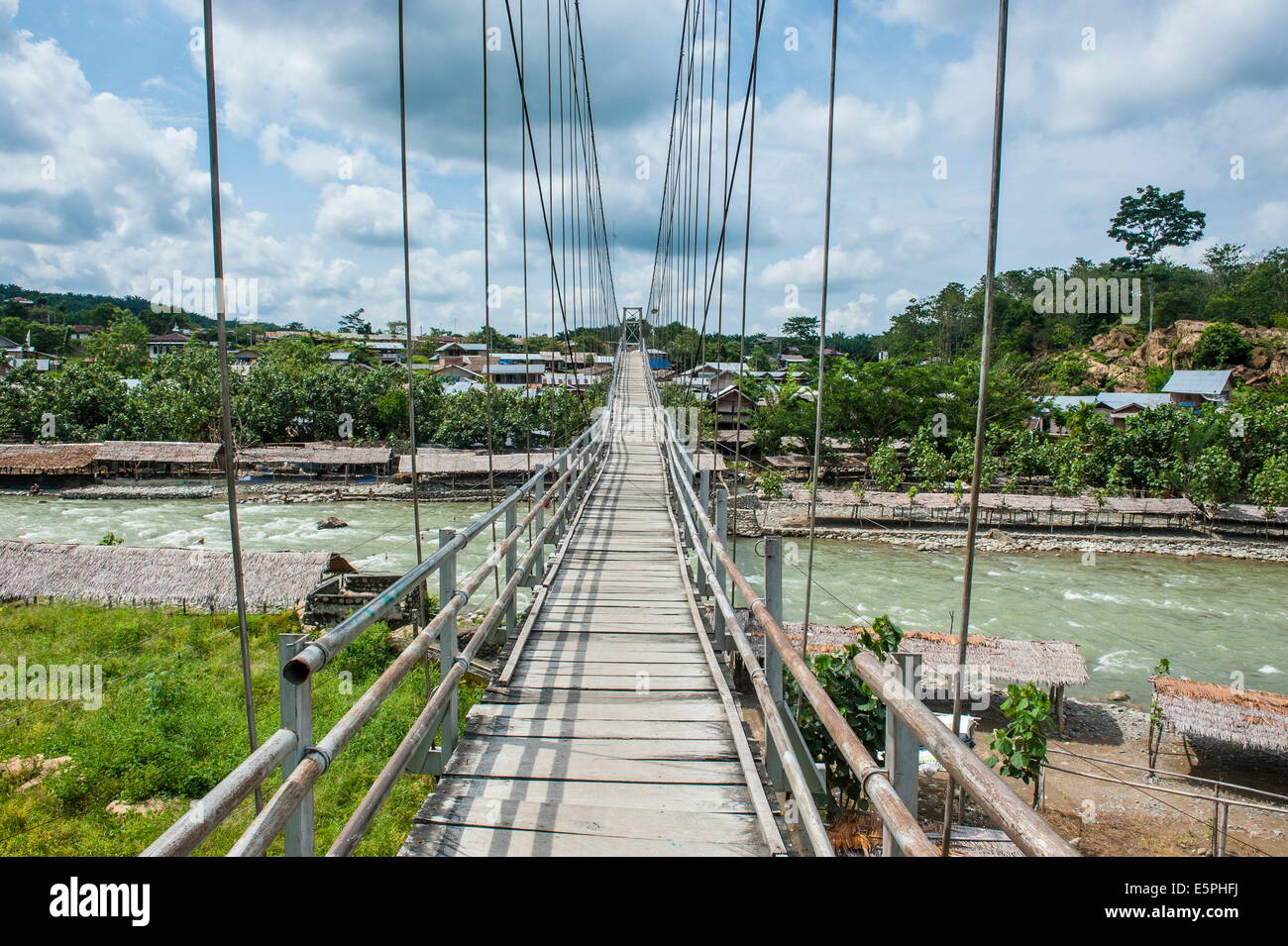 Huge hanging bridge spanning above the Bohorok river, Bukit Lawang, Sumatra, Indonesia, Southeast Asia, Asia Stock Photo