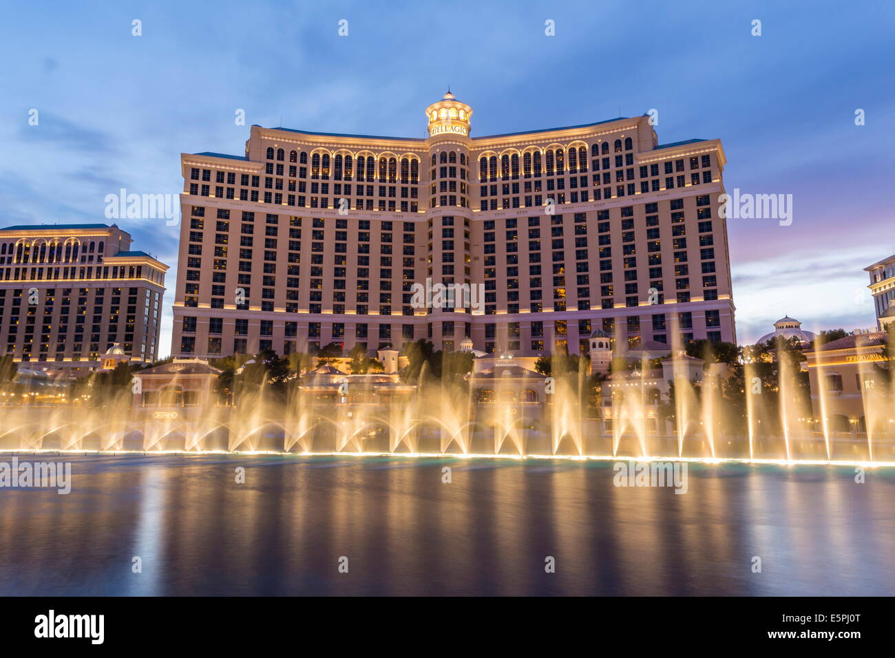 Bellagio at dusk with fountains, The Strip, Las Vegas, Nevada, United States of America, North America Stock Photo