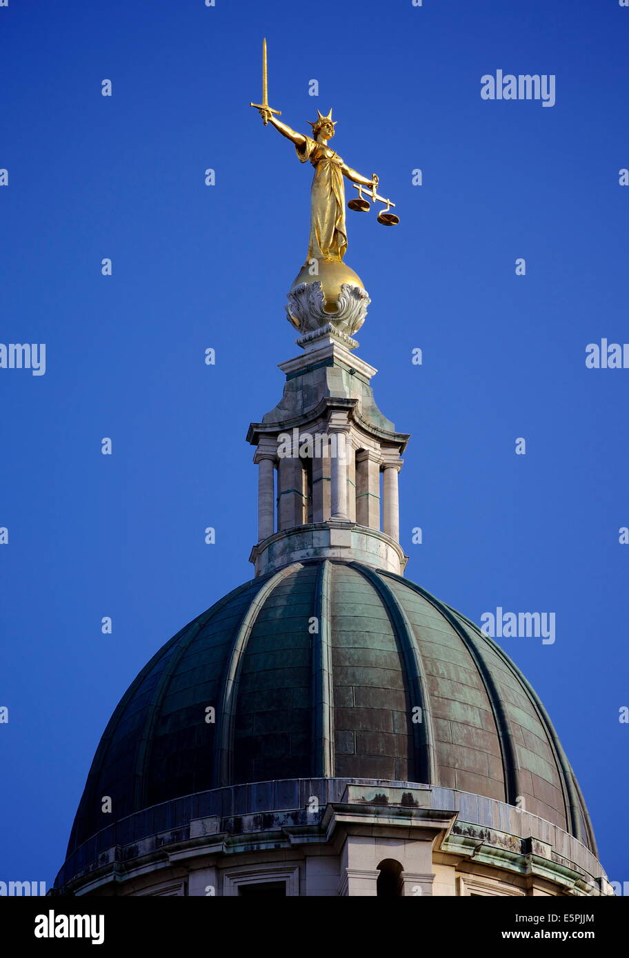 Scales of Justice above the Old Bailey Law Courts (Central Criminal Court) on former site of Newgate Prison, London, England, UK Stock Photo