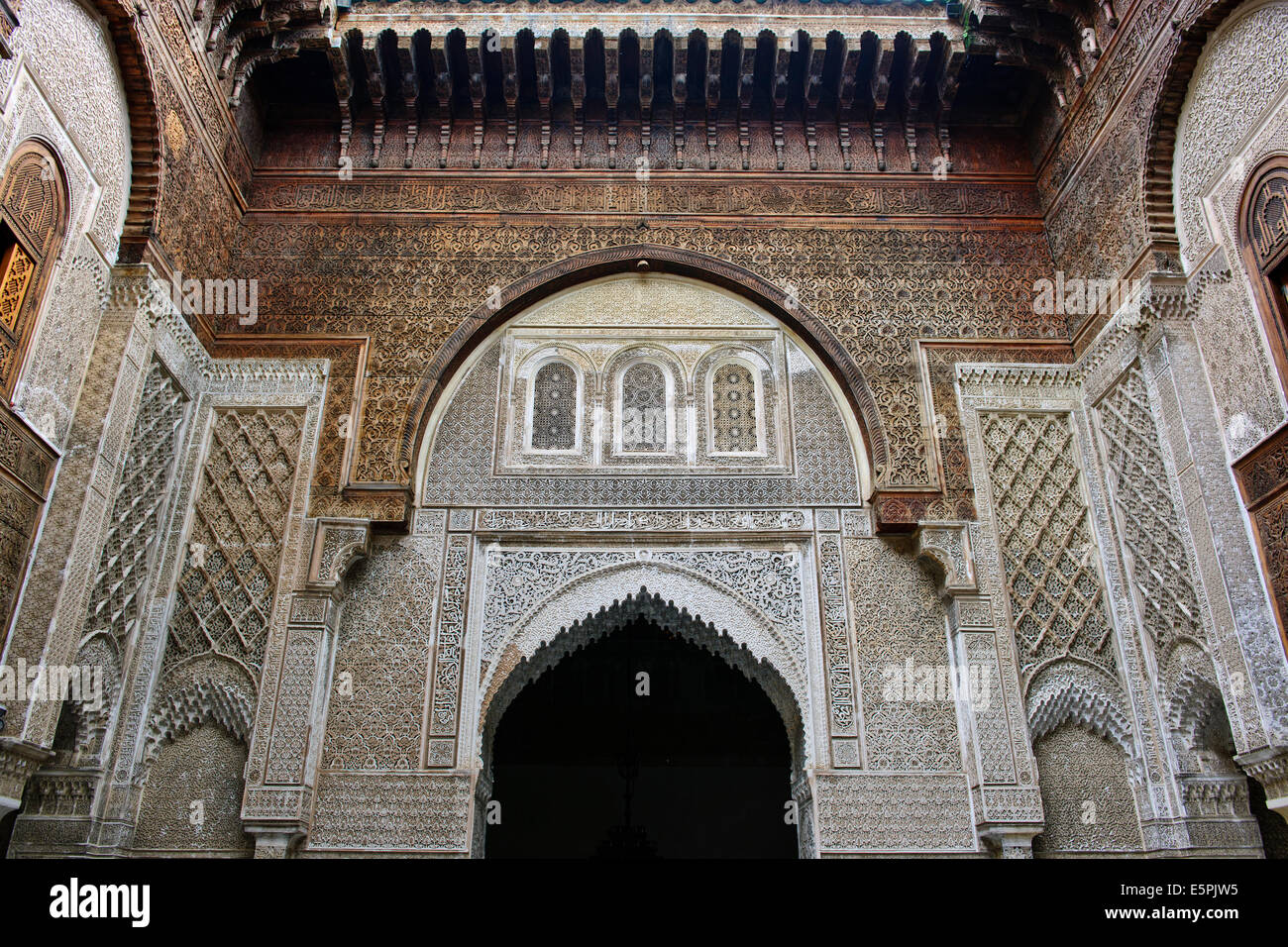 Madersa,Madrasa,Seat of Learning,School,Carved stucco panels,fountain courtyard,Cedar wood doors,Madrasa Seffarine,Fez,Morocco Stock Photo