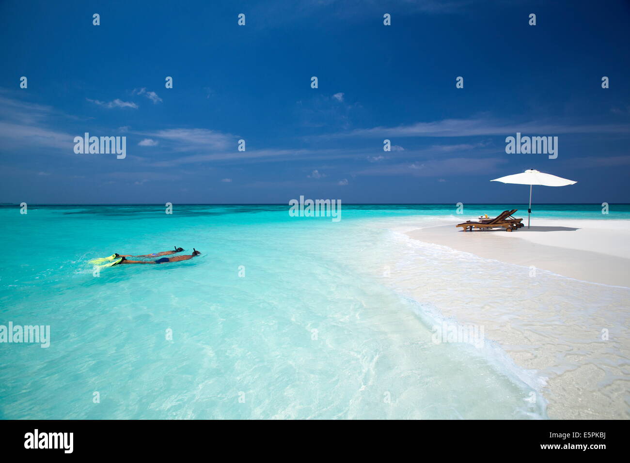 Couple snorkelling in Maldives, Indian Ocean, Asia Stock Photo