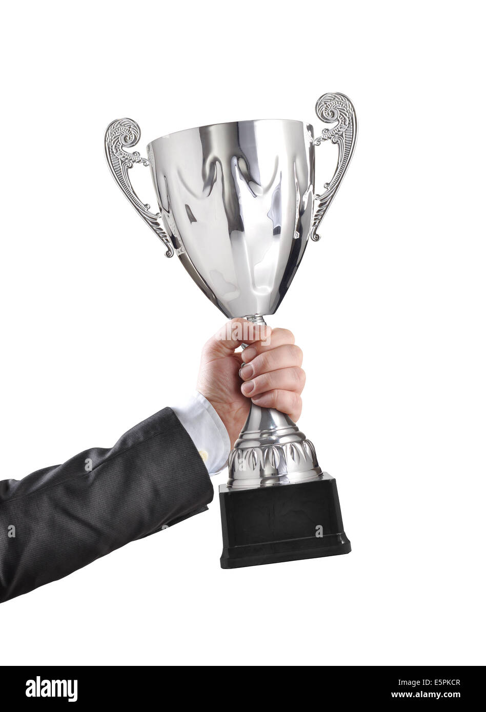 Businessman holding a champion silver trophy on white background Stock Photo