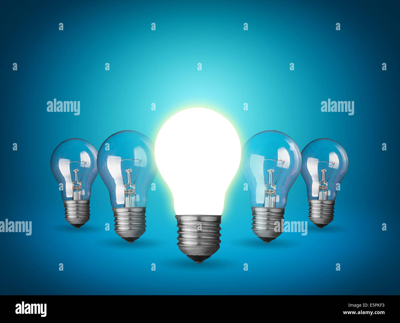 Idea concept with light bulbs on blue background Stock Photo - Alamy