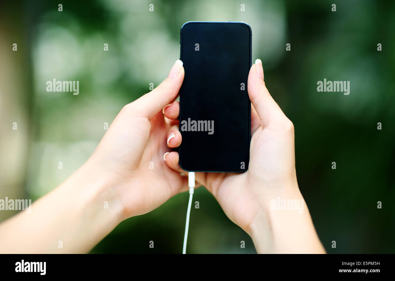Closeup portrait of a female hand holding smartphone Stock Photo - Alamy