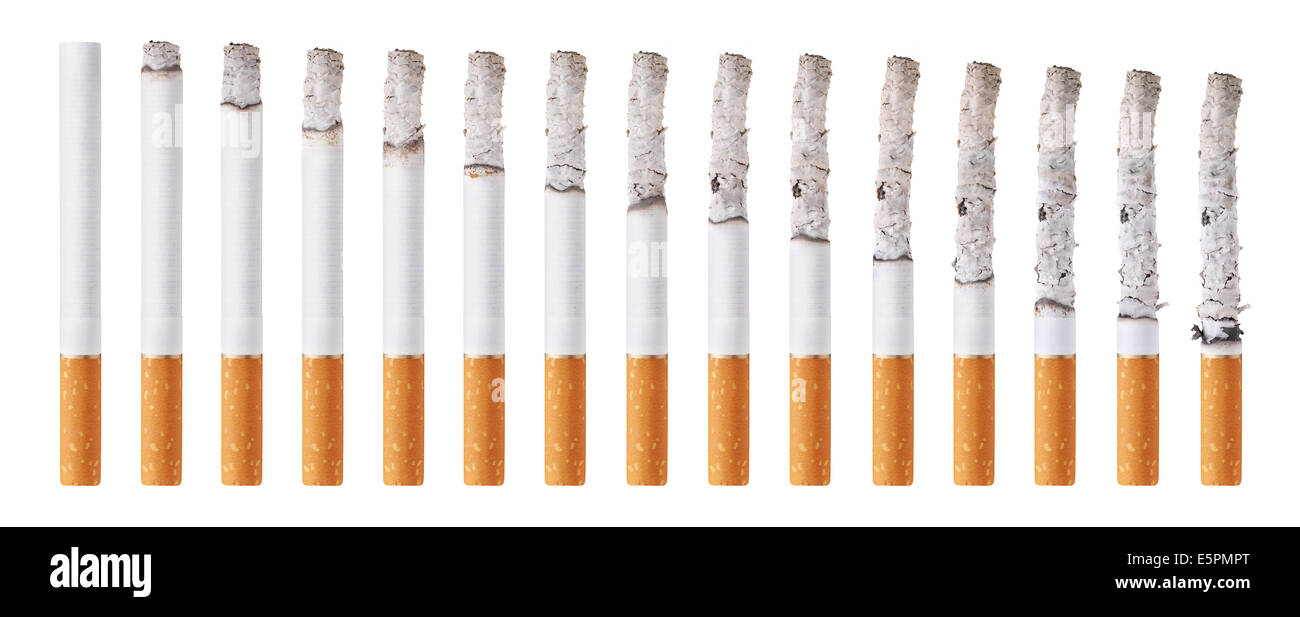 Cigarettes during different stages of burn. Isolated on white Stock Photo