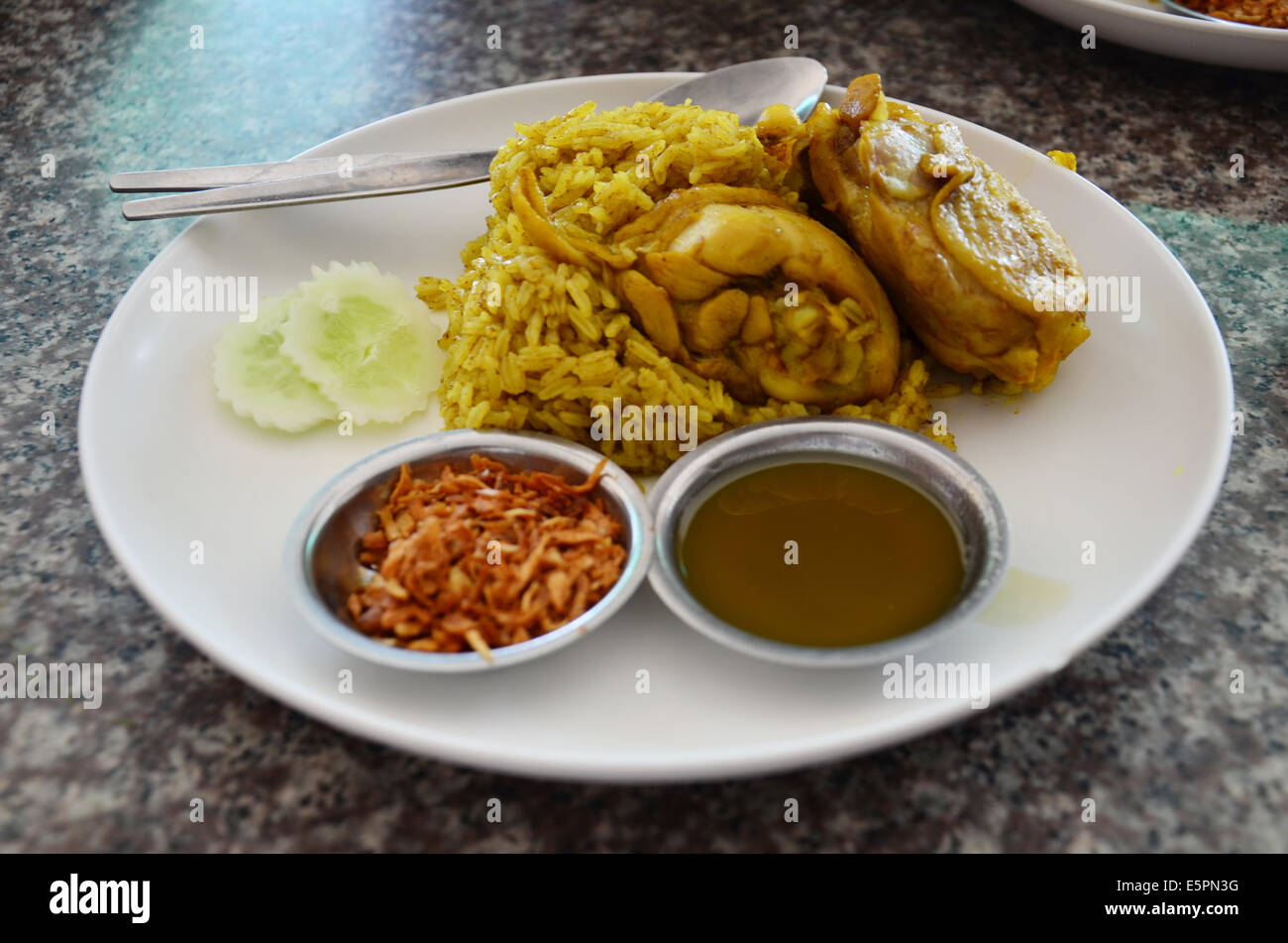 Chicken Biryani with green chutney or Chicken Biryani Stock Photo Alamy