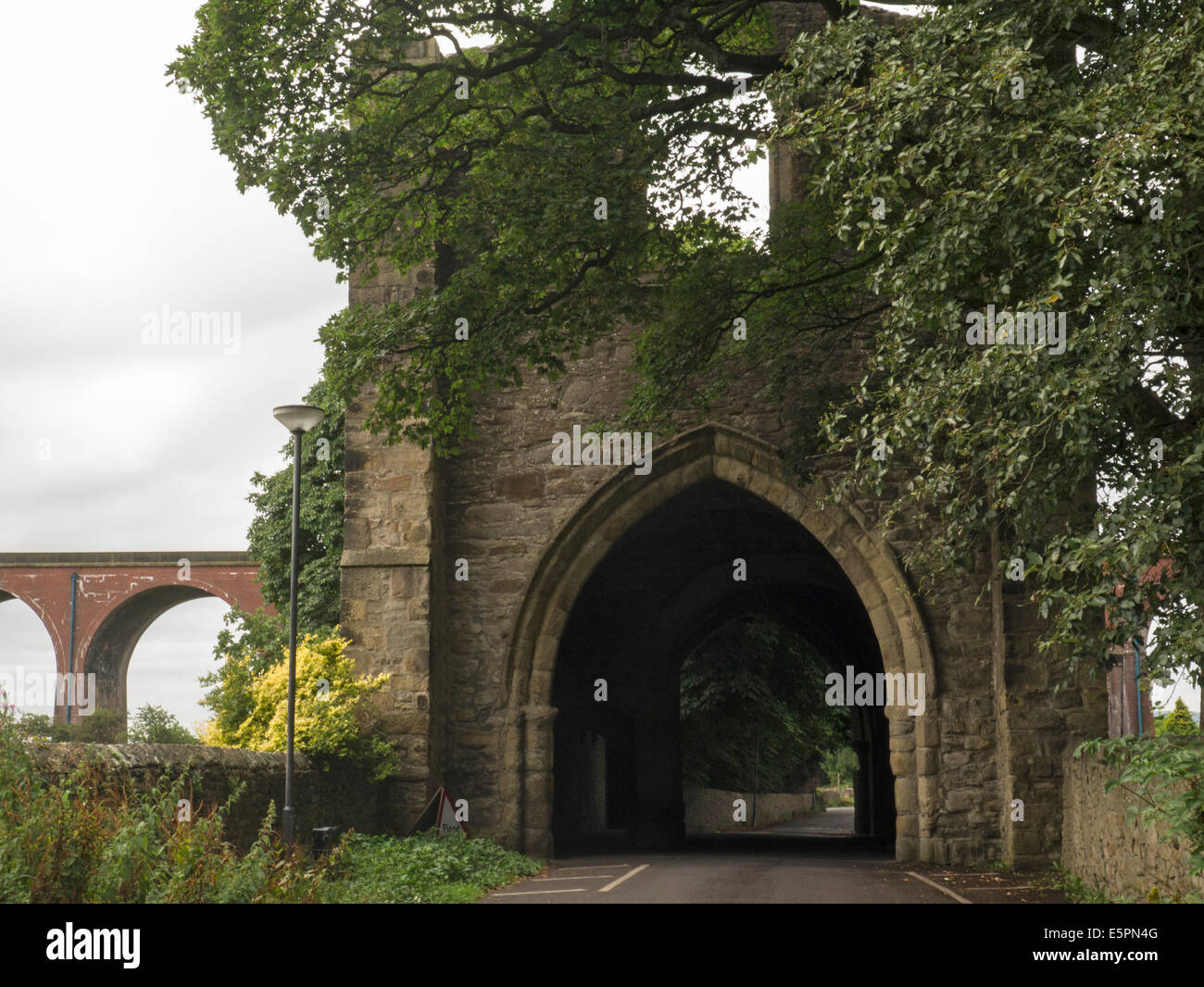 North East Gatehouse 1326 Whalley Abbey with Whalley Viaduct behind
