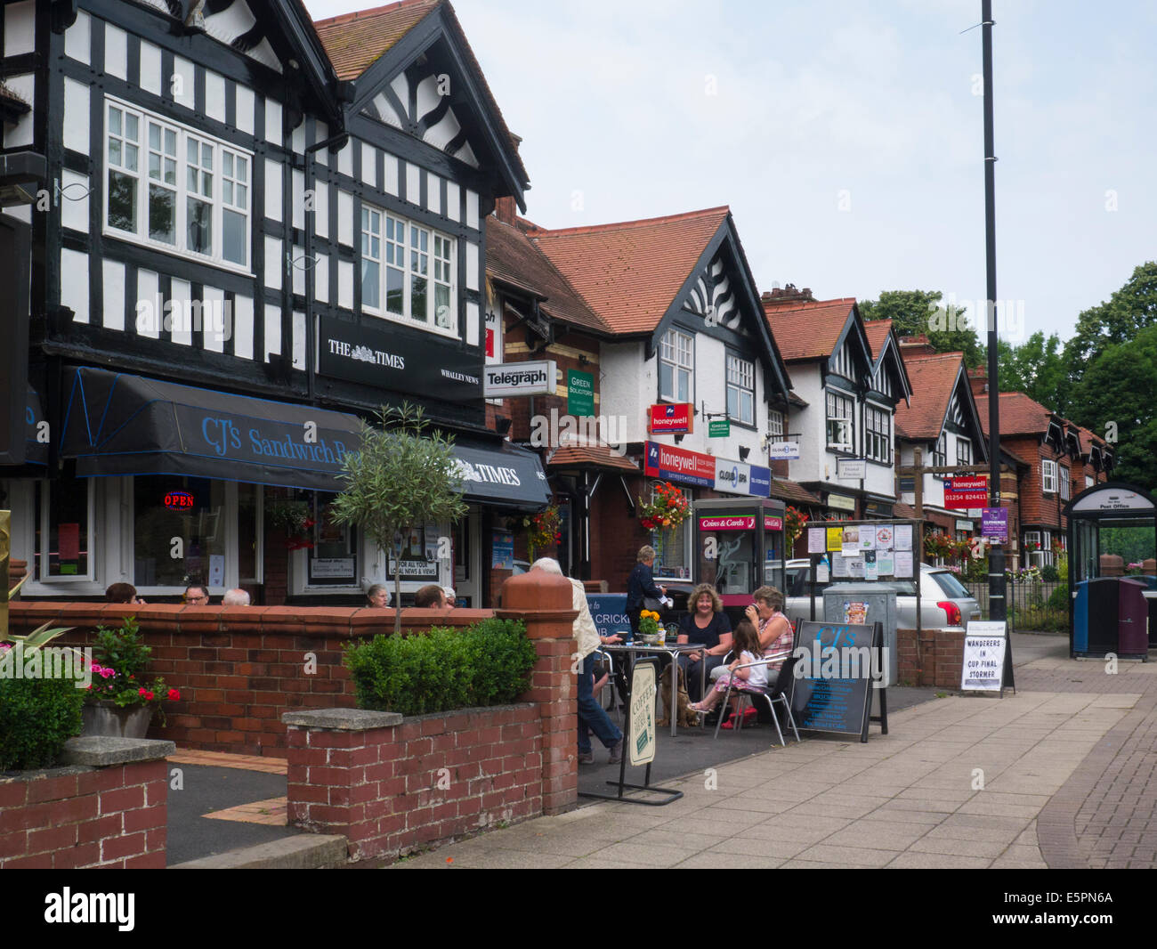Row of buildings housing local businesses Whalley Lancashire England UK