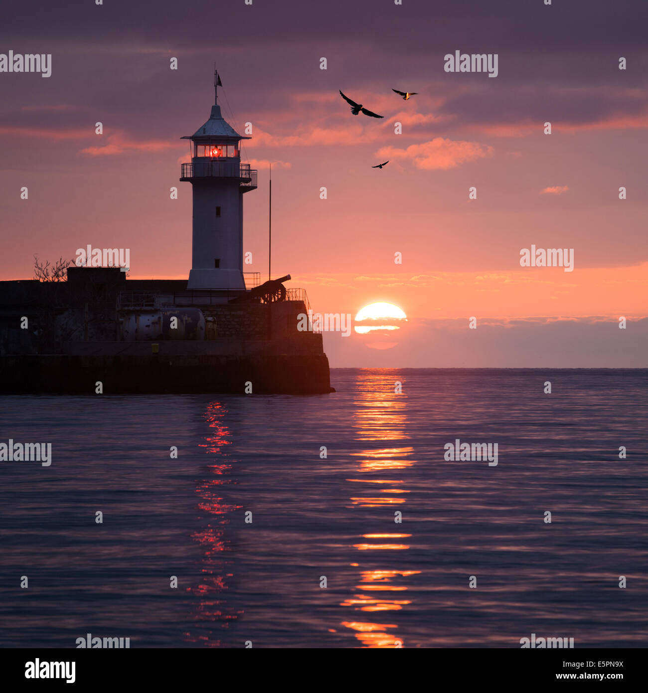 Lighthouse on sunrise. Yalta, Crimea, Ukraine Stock Photo Alamy