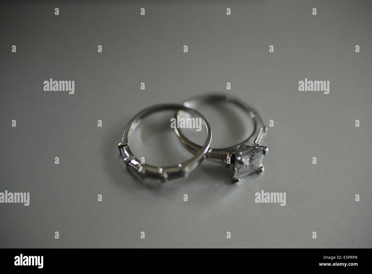 female wedding band and engagement ring Stock Photo Alamy