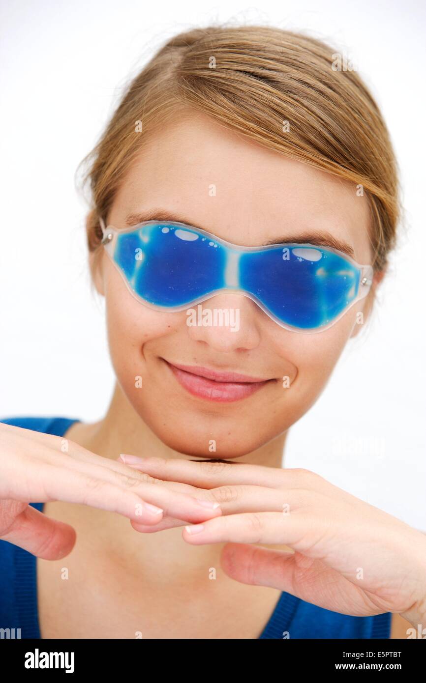This gel filled mask is cooled in a refrigerator before being placed on the face, The cooling effect is claimed to relieve Stock Photo