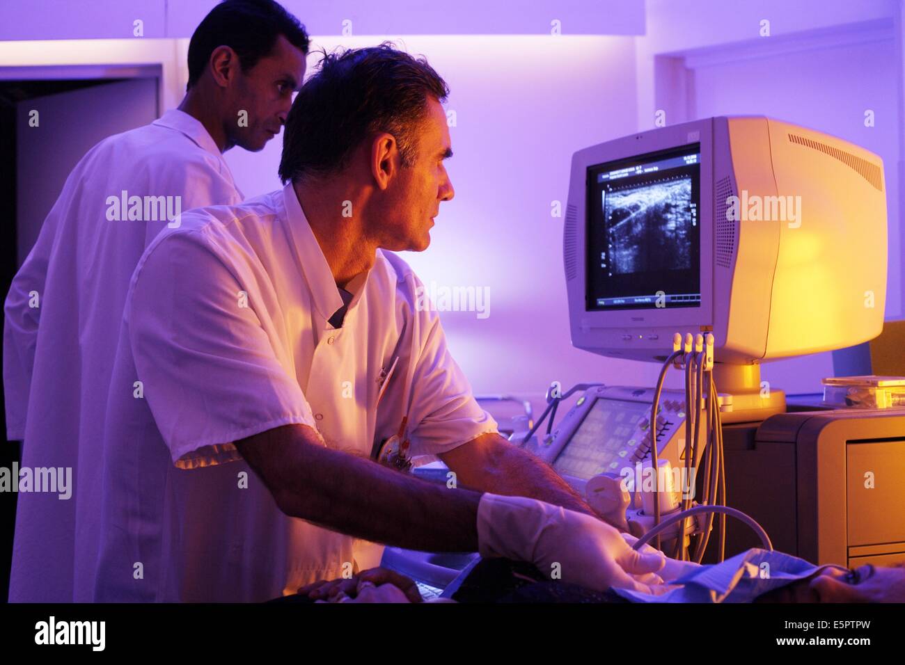 Pr de Kerviler, radiologist, set up of procedure of biopsy of