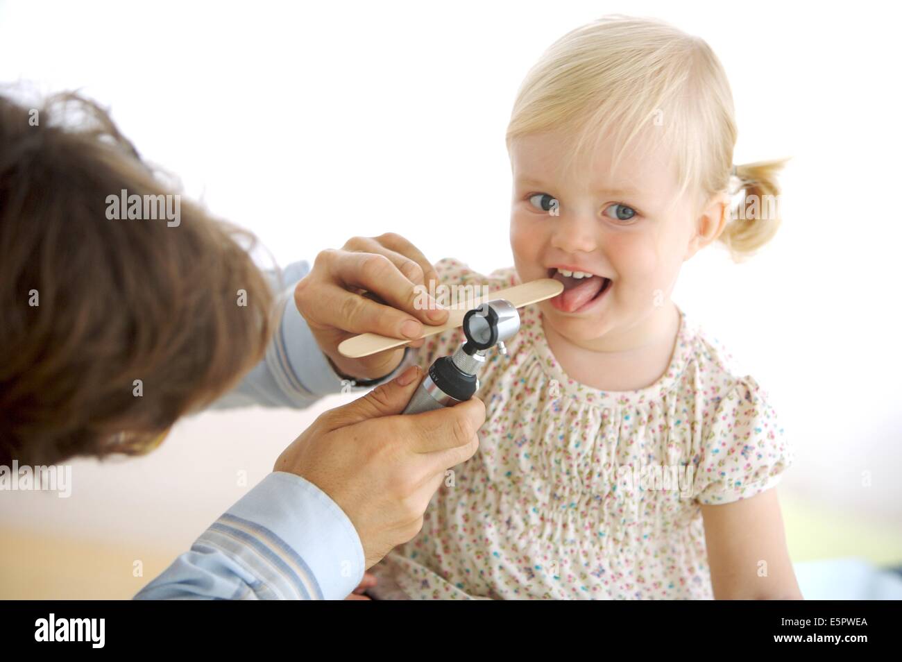 Nose And Throat Examination Otoscope Pediatrics Pediatrician Health Professional Stock Photos