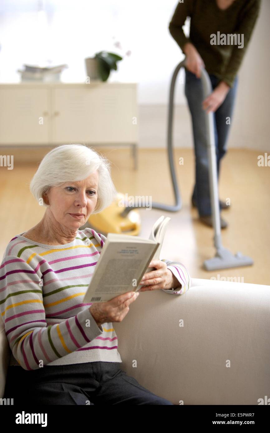 Elderly woman with home aid Stock Photo Alamy