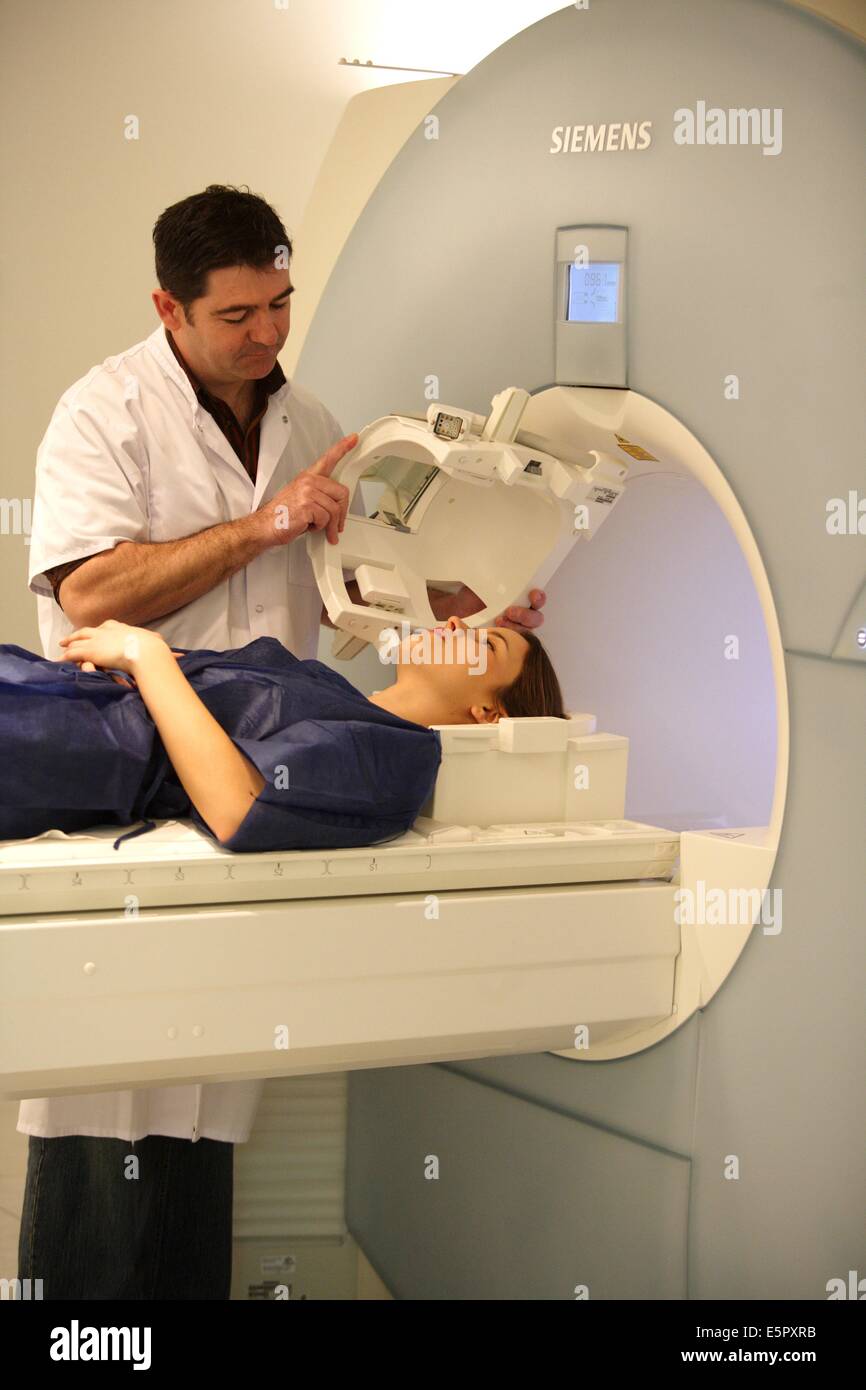 Patient undergoing a MRI (Magnetic Resonance Imaging) of the brain ...