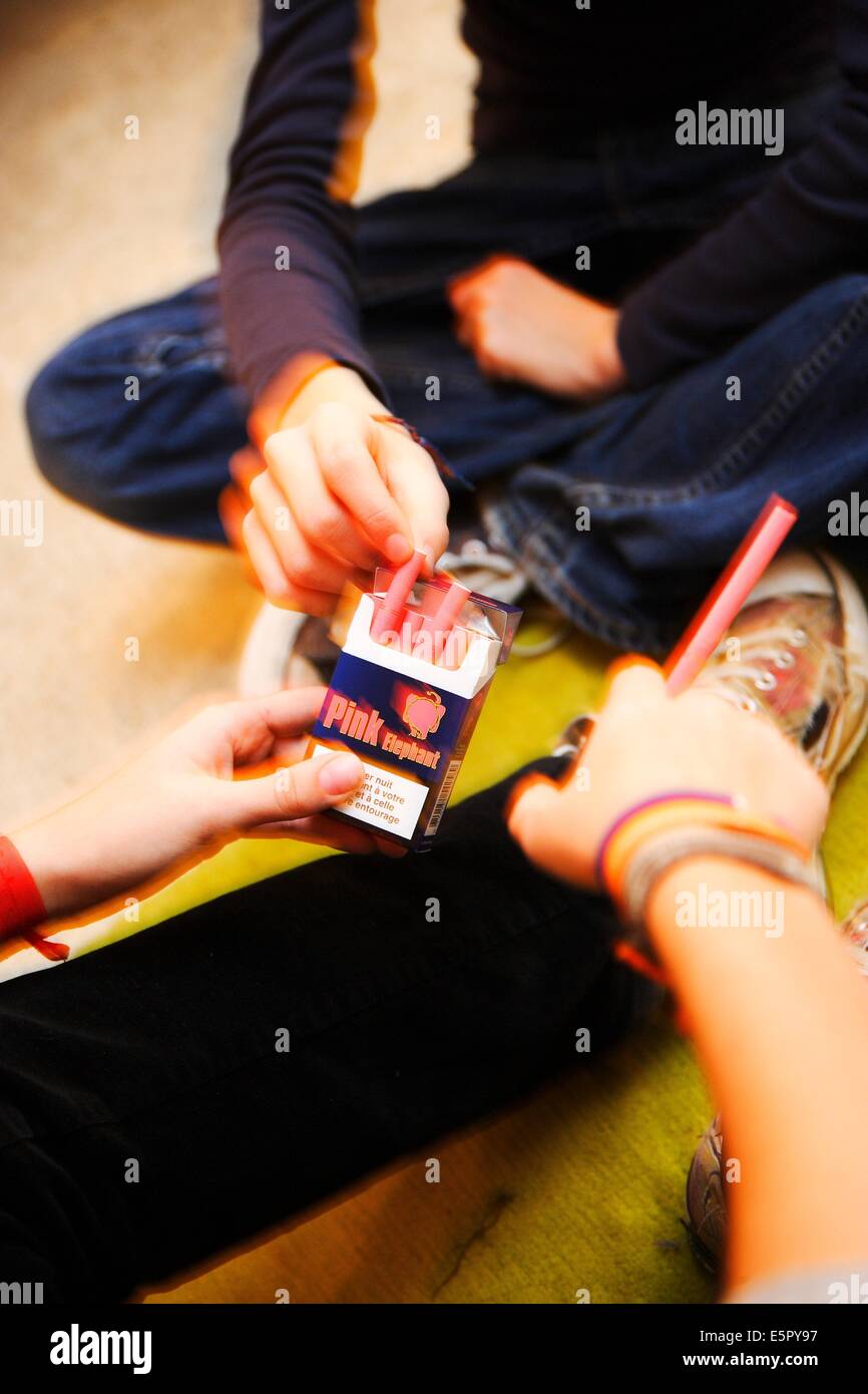 Teenagers smoking vanillaflavoured cigarettes Stock Photo Alamy