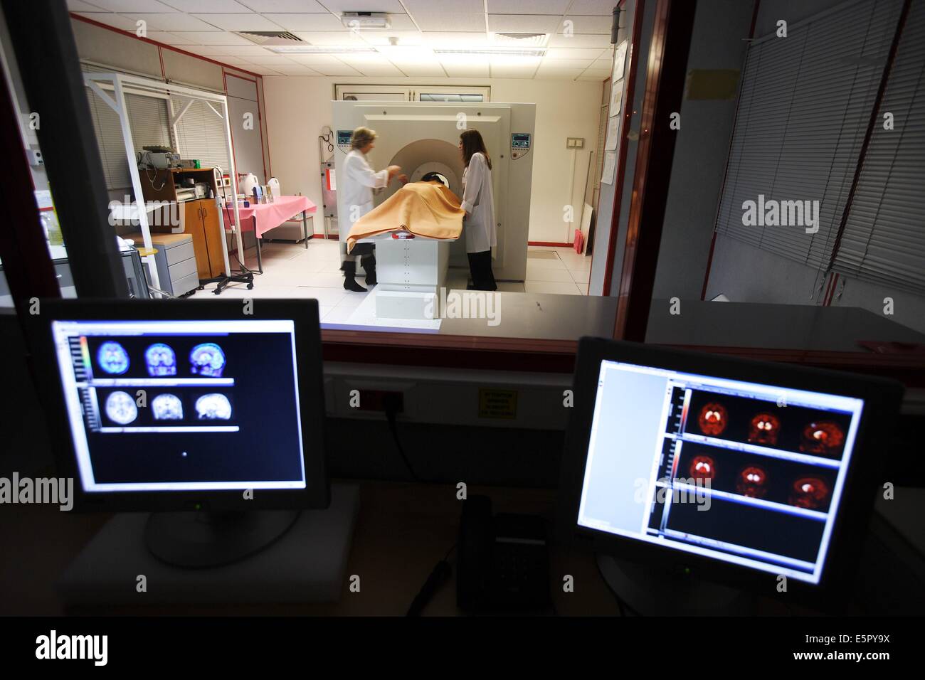 Patient undergoing Positrons Emission Tomography scan (PET scan) of the brain. Stock Photo